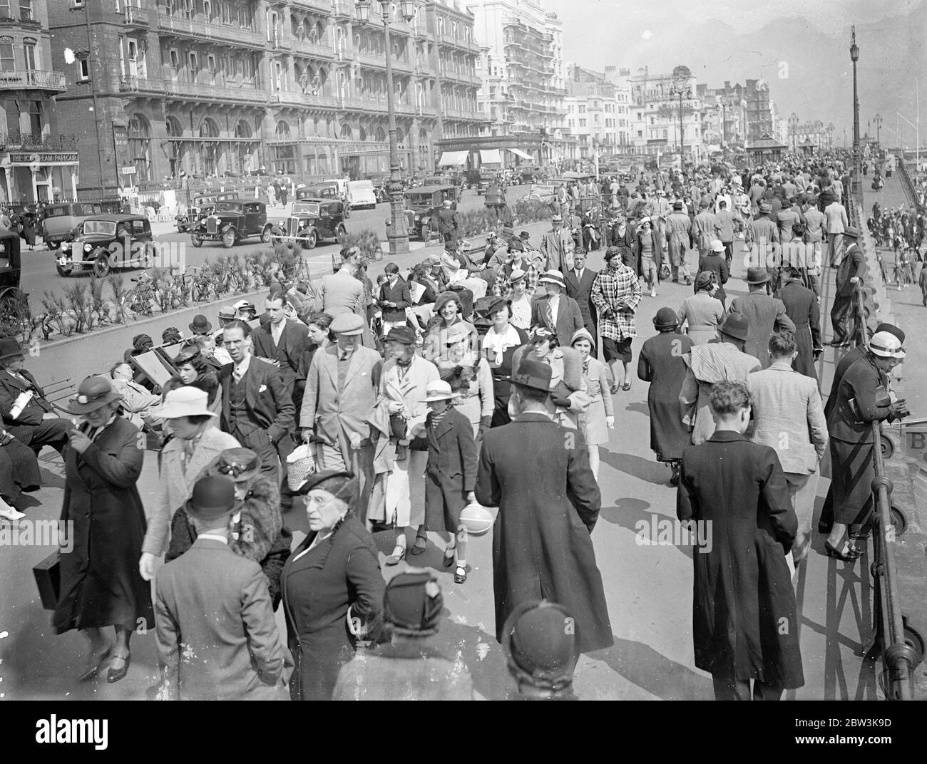 Holiday Crowds Seek The Sun at Brighton Whitsun holidaymakers , searching for the sun , flocked in their thousands to Brighton today ( Whit - Sunday ) . The sun shone brilliantly throughout the day and the beaches , promenade and piers were packed . Photo Shows : The dense crowds on the promenade at Brighton today ( Whit - Sunday ) 31 May 1936 Stock Photo