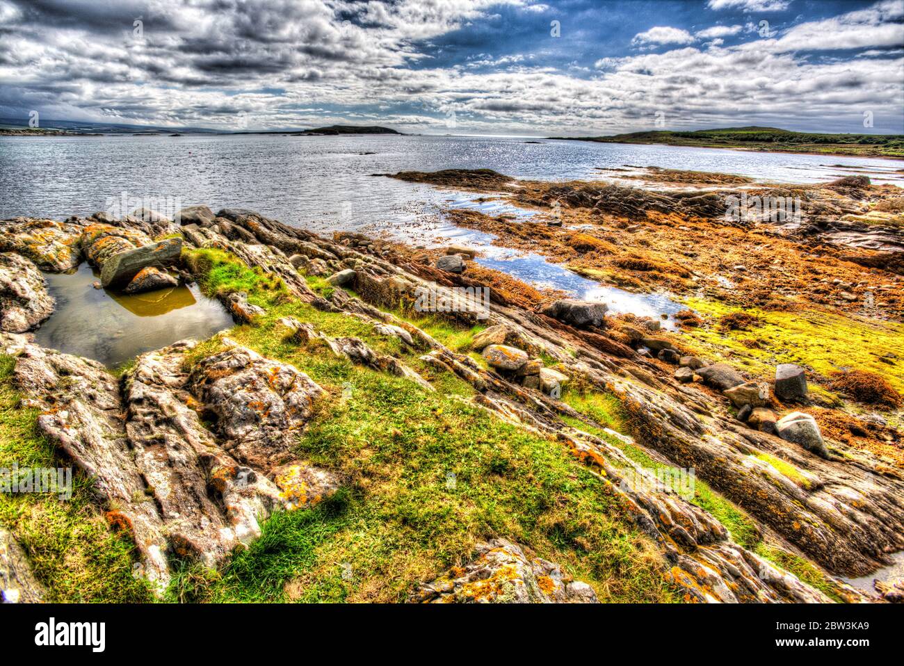 Isle of Gigha, Scotland. Artistic tranquil view of the coastline at Caolas Gigalum, on the south-east coast of the Isle of Gigha. Stock Photo