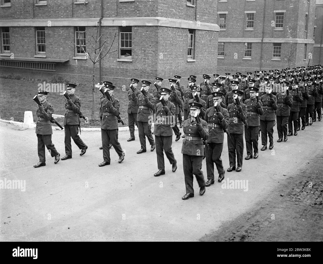 RAF recruits to march in Beatty 's funeral procession . Remarkable precision after only short training . RAF recruits rehearsing with reversed arms for the funeral procession , at the Uxbridge depot . 13 March 1935 Stock Photo