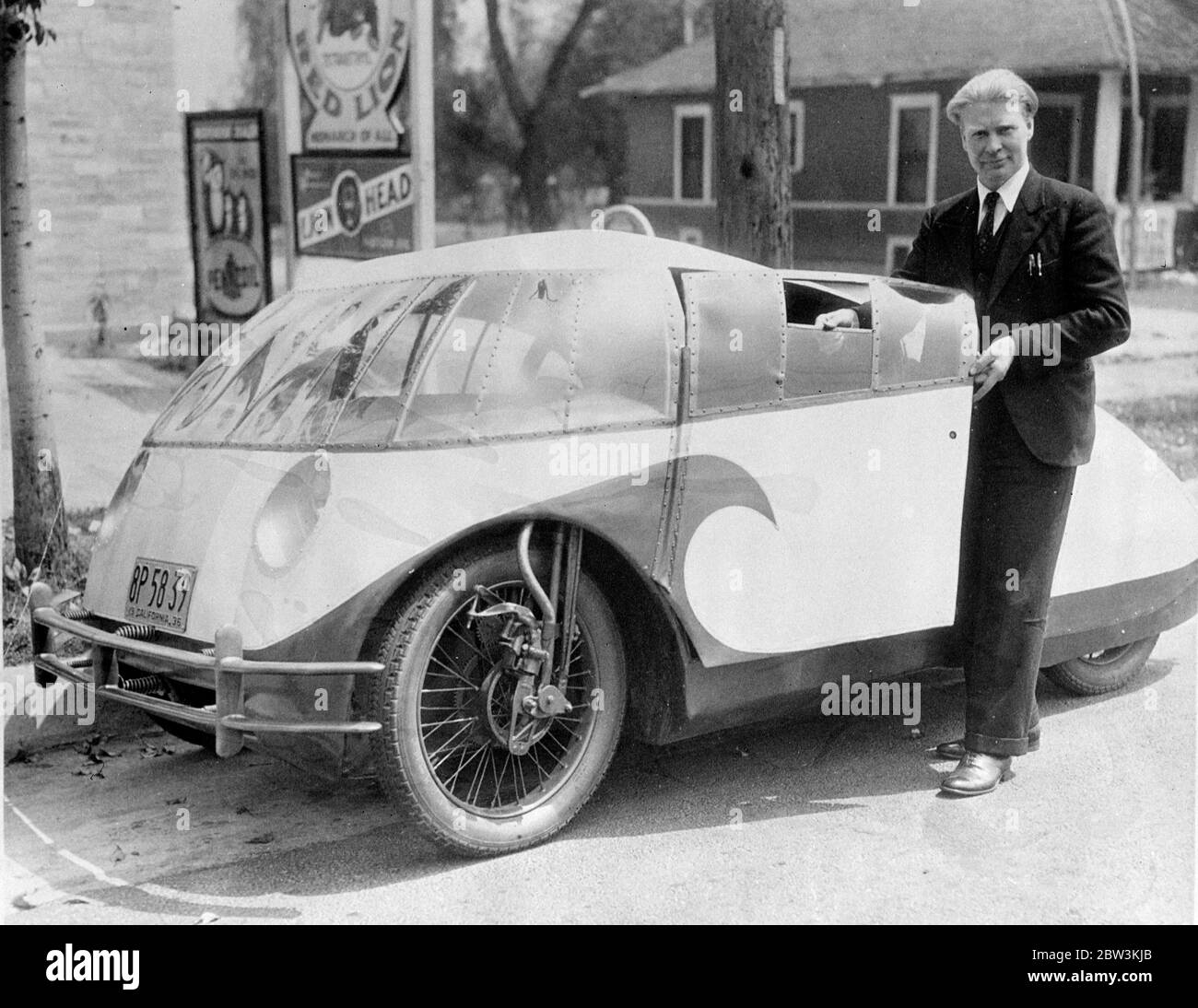 The car of the future , bug like , but crash proof . Bug like in appearance , wreck proof and proof against carbon monoxide gas , the ' car of the future ' has been designed and built by Dr Calvin B Bridges , a well known biologist of the CaliforniaInstitute of Technology at Pasadena , California . Chritened the lightning Bug , the new car is considered by engineers to be the one most resembling the vehicle of the future . Photo shows Dr Calvin B Bridges with his lightning bug . 29 April 1936 Stock Photo