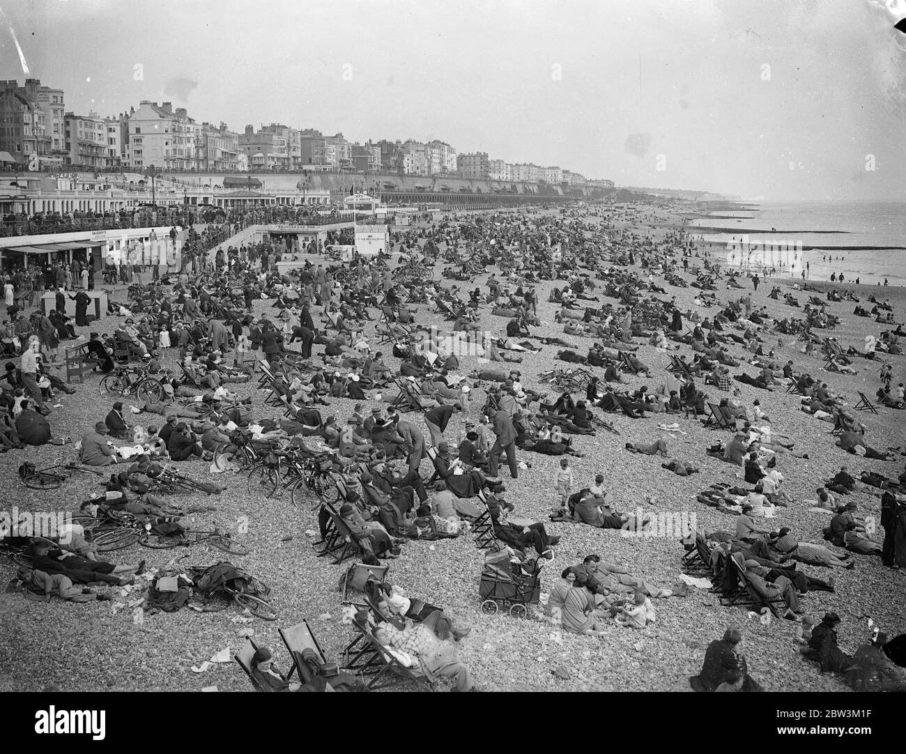 Holiday Crowds Seek The Sun at Brighton Whitsun holidaymakers , searching for the sun , flocked in their thousands to Brighton today ( Whit - Sunday ) . The sun shone brilliantly throughout the day and the beaches , promenade and piers were packed . Photo Shows : The crowded beach at Brighton today ( Whit - Sunday ) 31 May 1936 Stock Photo