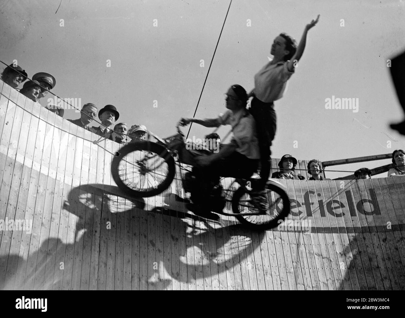 This pillion rider must hold tight , wall of death rider . 11 September 1935 Stock Photo