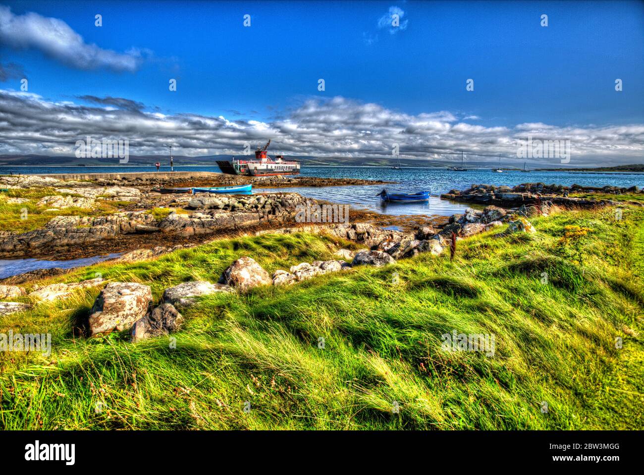Isle of Gigha, Scotland. Artistic view of the CalMac ferry MV Loch Ranza arriving at Ardminish jetty, on the Isle of Gigha. Stock Photo