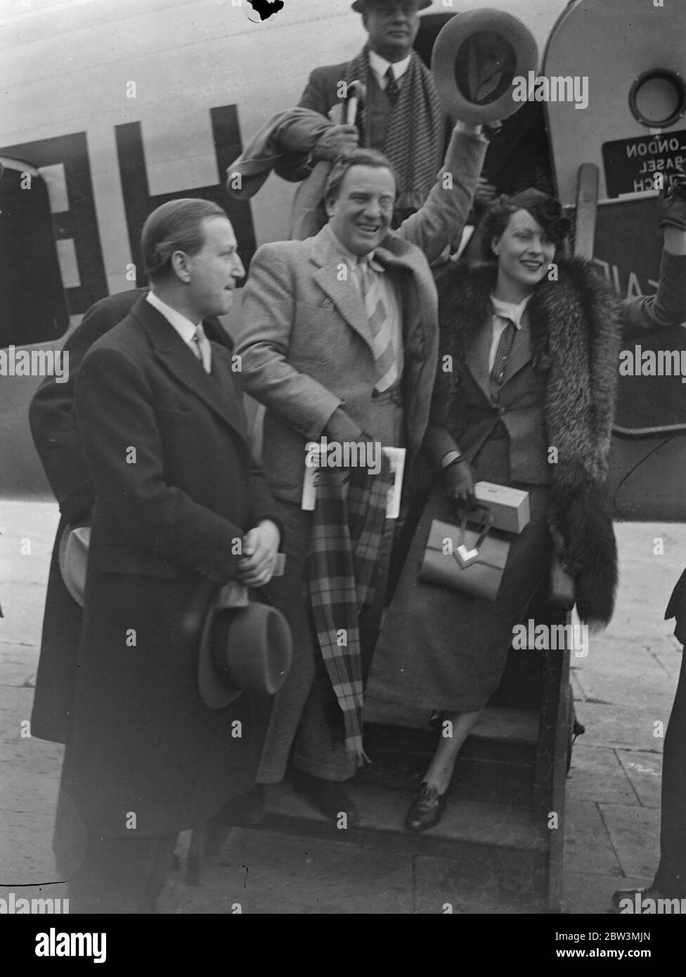 Richard Tauber and film actress fiancee . Richard Tauber , the singer , accompanied by his fiancee , Diana Napier , the film actress , arrived at Croydon by air from Zurich . The Vienna courts recently granted a divorce between Tauber and his wife . Photo shows , Richard Tauber with his fiancee , Diana Napier , on arrival at Croydon . 17 April 1936 Stock Photo