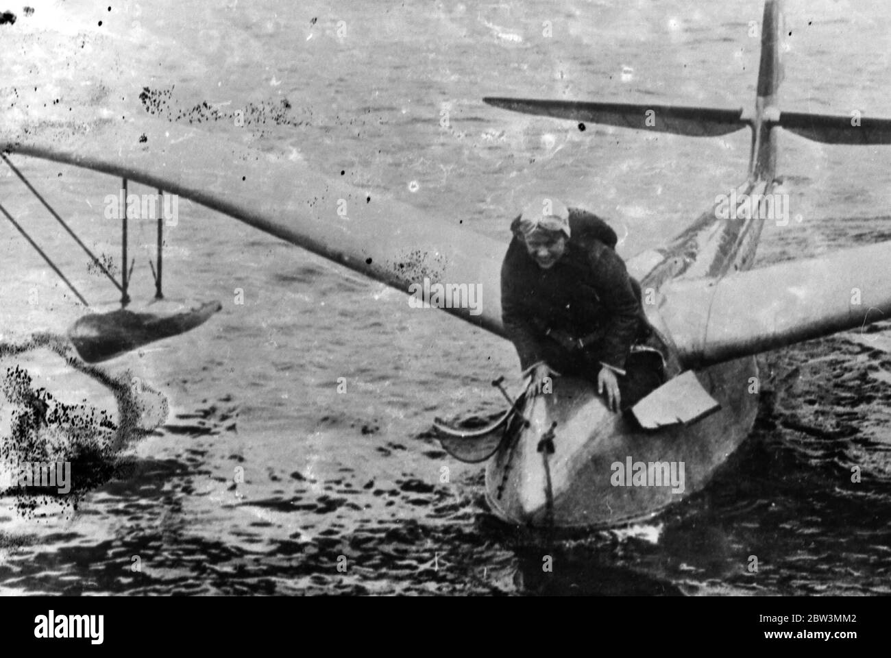German woman pilot demonstrates new sea glider . A new type of sea glider was demonstrated by Miss Reitach , a German woman pilot on the Bodensea . The demonstration was watched by experts of the German Sail plane investigation institute . Hanna Reitsch was towed into the air and remained aloft for 30 minutes , after which she made a perfect ' landing ' on the water . The craft has a wing span of 55 feet . Photo shows Hanna Reitch aboard the new sea glider after the test . 30 November 1935 Stock Photo