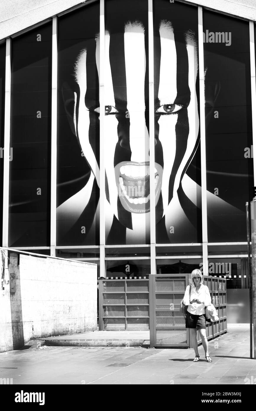 Rome / Italy - 28 June 2015: Advertising of the Juventus football team with a Striped woman face on a wall poster out of the train station in Italy Stock Photo