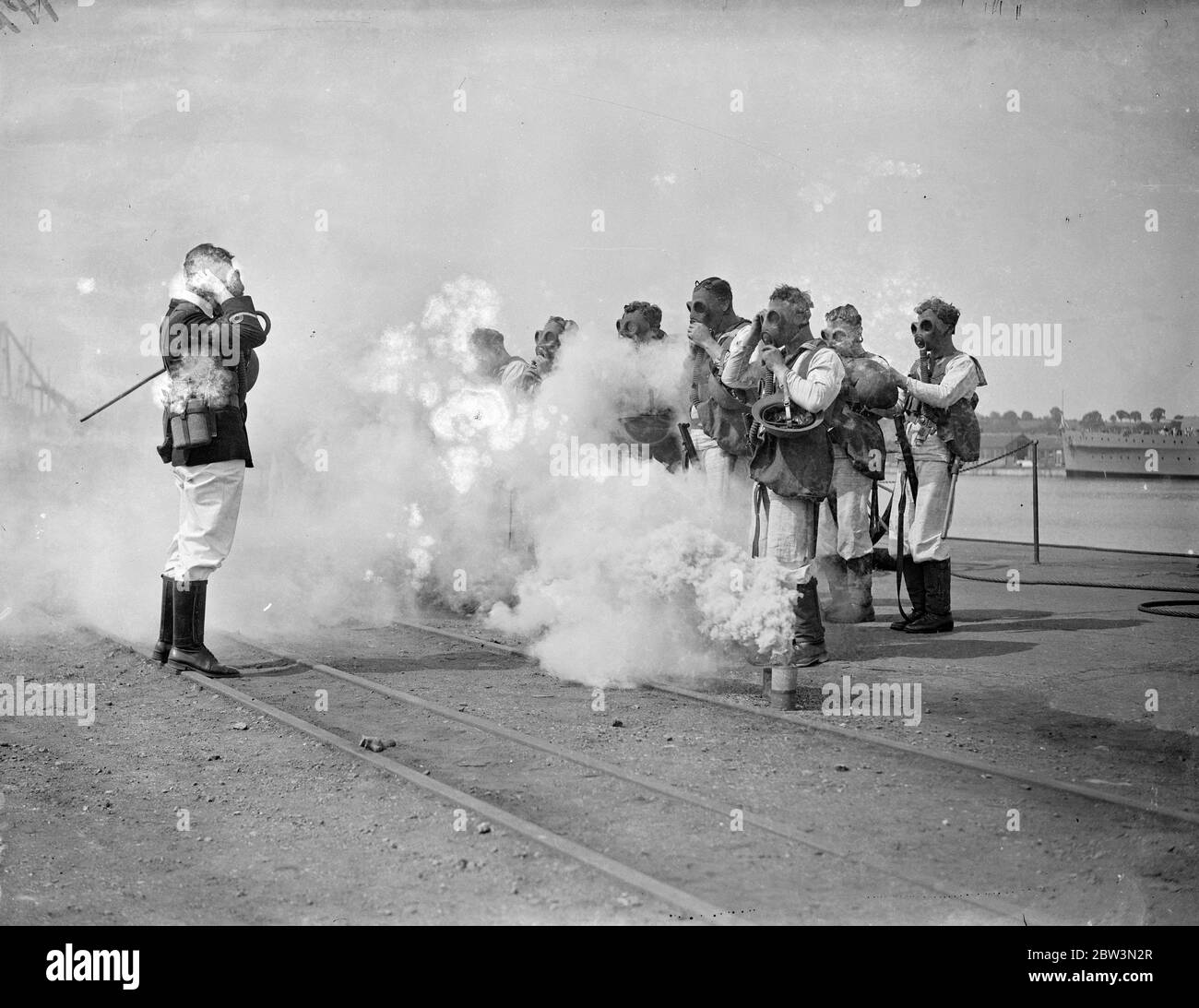 Gas mask instruction at Chatham for Navy week . 1 August 1935 Stock Photo