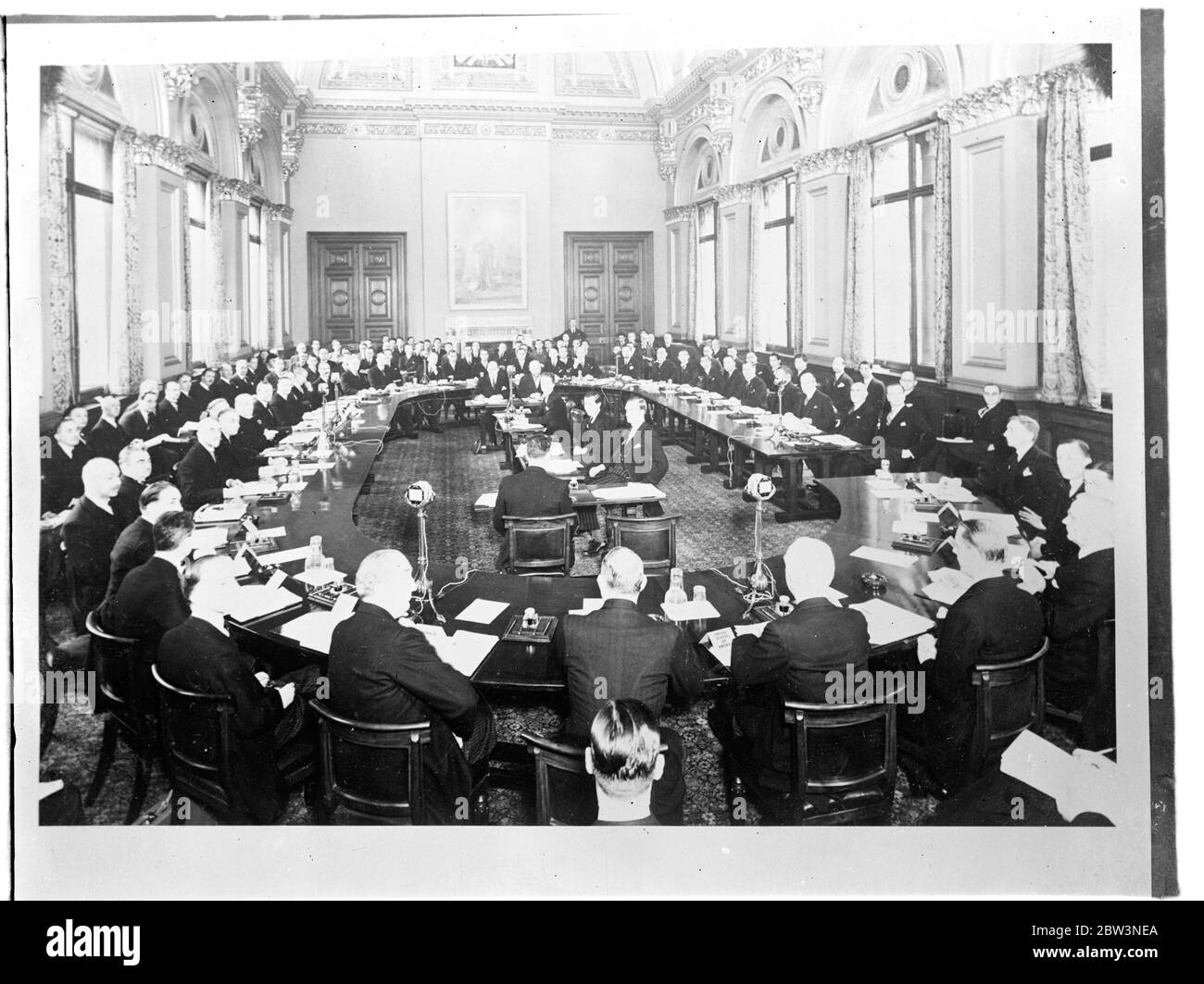 Premier opens five power naval conference . The scene at the opening of the conference . Mr Baldwin can be seen centre on left . 9 December 1935 Stock Photo