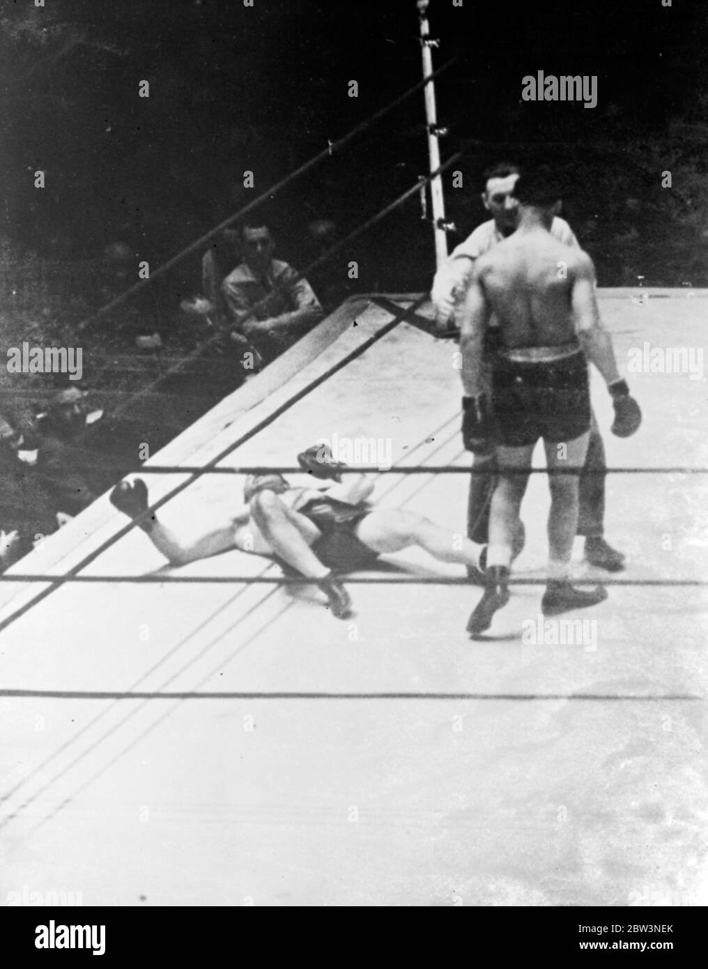 Paulino hits canvas for first time in 13 years as Joe Louis pounds him to defeat . Punched from pillar to post after having been floored for the first for the first time in 13 years , Paulino Uzcudan , the Spanish heavyweight , became the latest victim of Joe Louds , the ' Brown Bomber ' at Madison Square Garden , New York . Louis was awarded the decision on a technical knock out in the fourth round . Photo shows , paulino floored , for the first time in 13 years , from a terrific right to the jaw by Joe Louis in the fourth round . Louis is being led to a neutral corner by Referee Arthur Donov Stock Photo