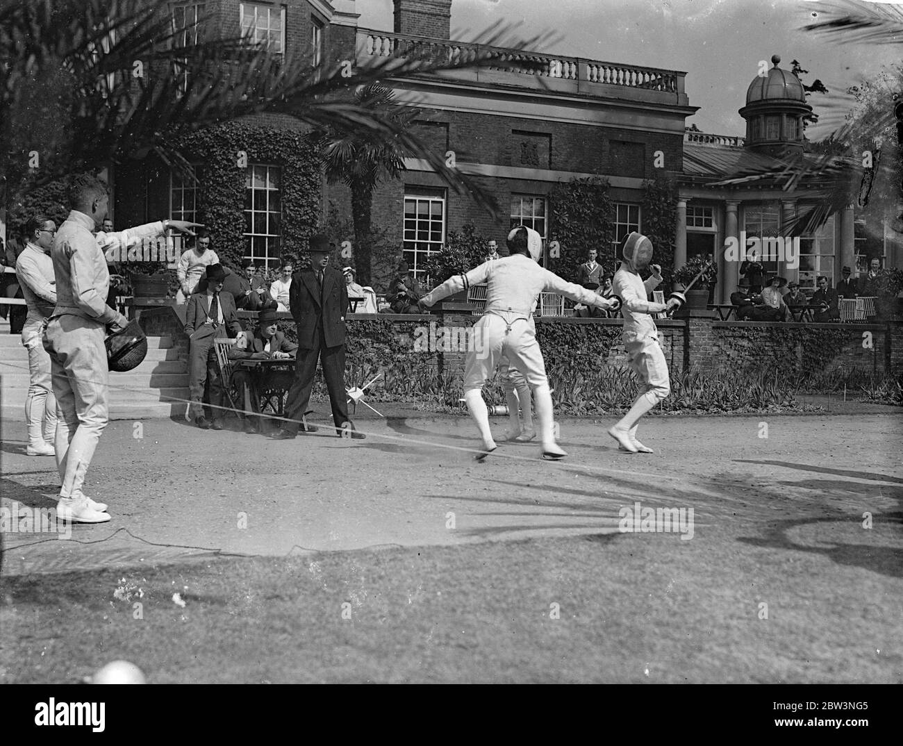 Winning thrust . Cambridge captain defeated in varsity fencing . Oxford and Cambridge met in an inter varsity fencing match at Danelagh , London . Photo shows , M A I Cripps of Oxford scoring his winning point against J I W Cheyne , Cambridge captain , whom he defeated 2 - 1 . 18 May 1936 Stock Photo