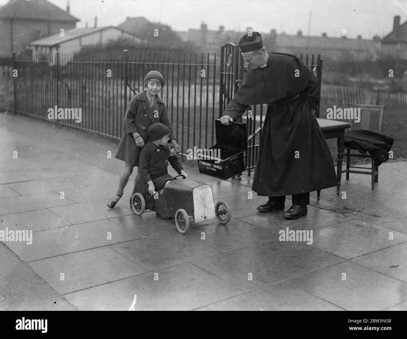 Clergy beg in the street . 5 October 1935 Stock Photo Alamy