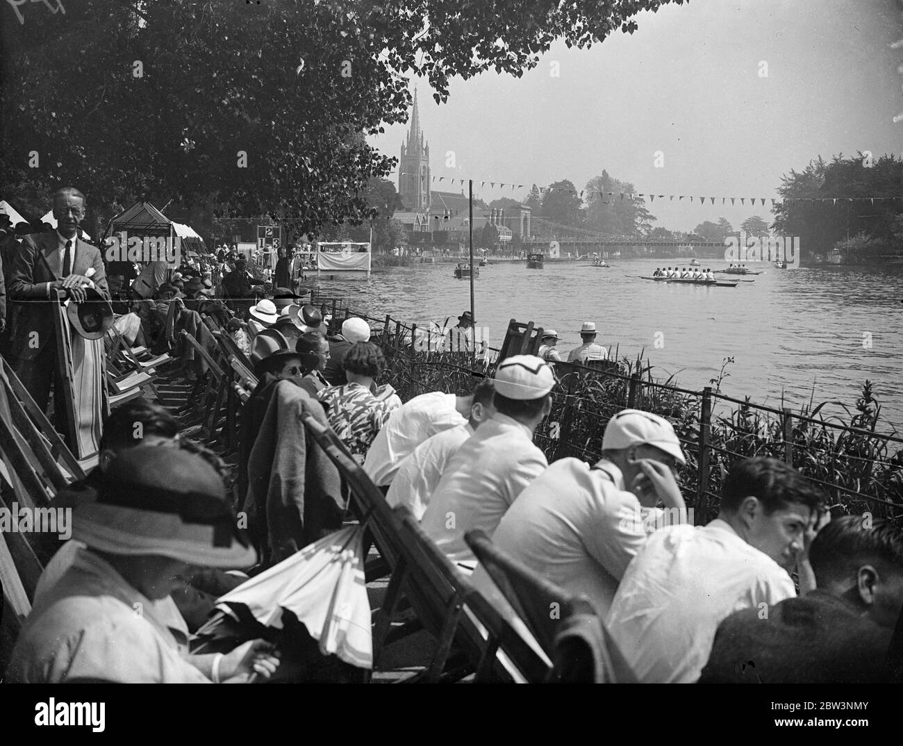 Marlow regatta opens in brilliant sunshine . One hundred and twenty crews , including several from overseas , ar competing . A general view of the regatta . 20 June 1936 Stock Photo