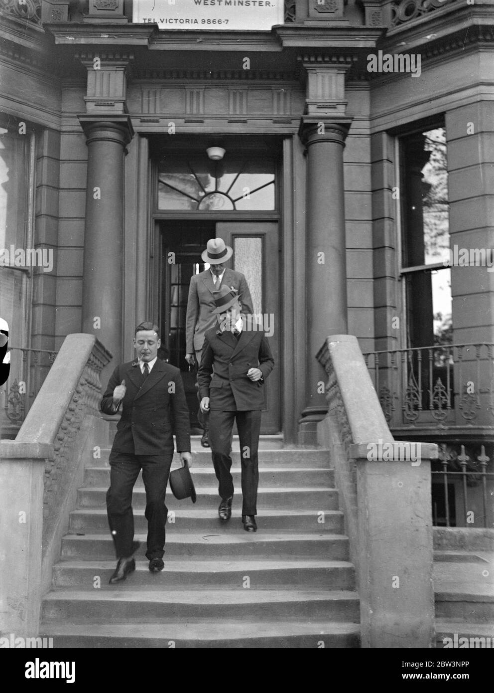 First police  graduates  go on duty . Police  graduates  leaving their new headquarters in Pembridge Gardens , Bayswater , to report at Scotland Yard for duty . 16 September 1935 Stock Photo