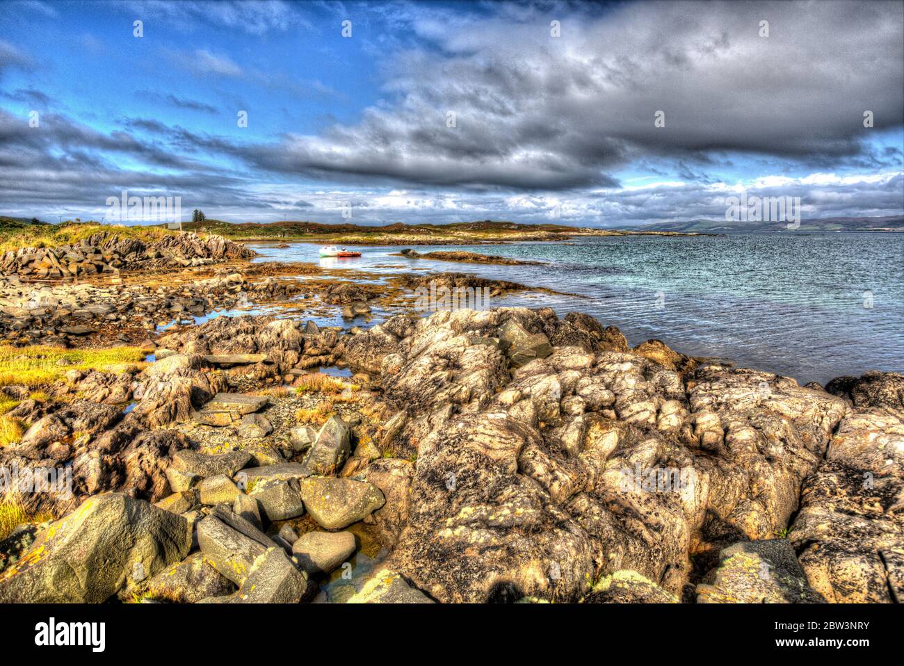 Isle of Gigha, Scotland. Artistic tranquil view of the coastline at Ardminish Bay, on the Isle of Gigha. Stock Photo