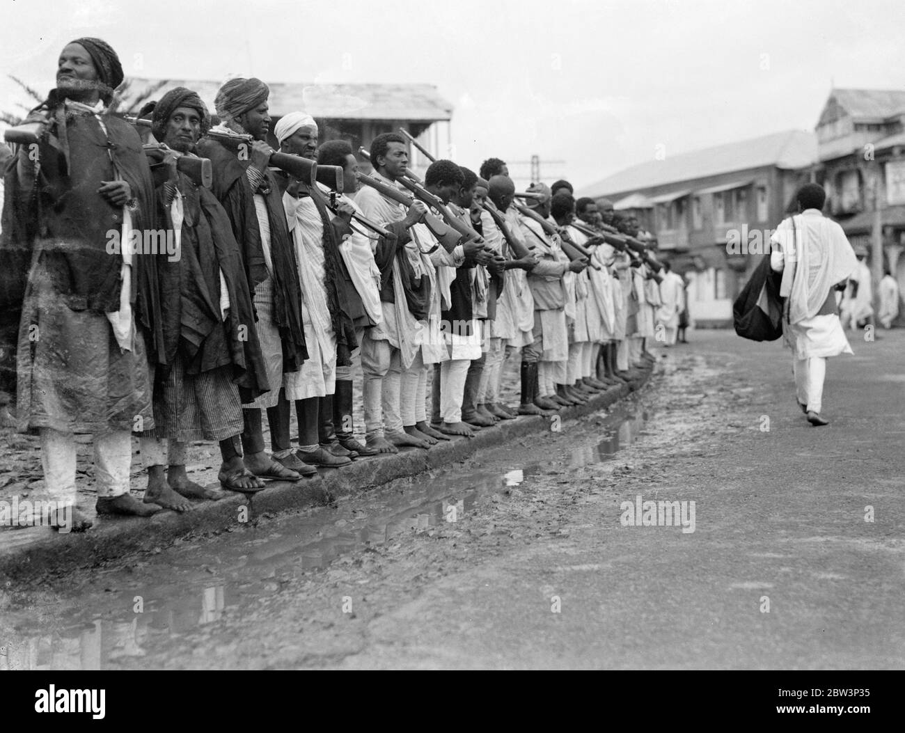 Footwear  fashions  in Abyssinia . A variety of footwear  styles  worn by a contingent of Muslim tribesmen about to leave Addis Ababa for the Ogaden . 28 September 1935 Stock Photo