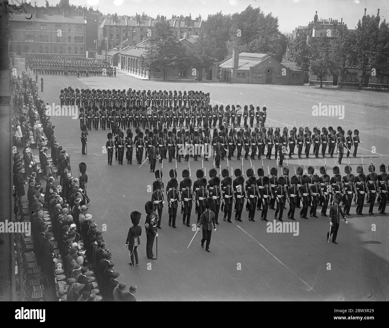 Lieut - General Sir Alfred Codrington Inspects Coldstream Guards . Lieut - General Sir Alfred Codrington , Colonel of the Regiment , inspects the Coldstream Guards at Chelsea Barracks . All three batalions , the two companies of recruits from Guards Depot at Caterham , the band of the regiment , and a detachment of the old Coldstreamers ' Association were on parade . Photo shows : The march past . 13 Jul 1936 Stock Photo