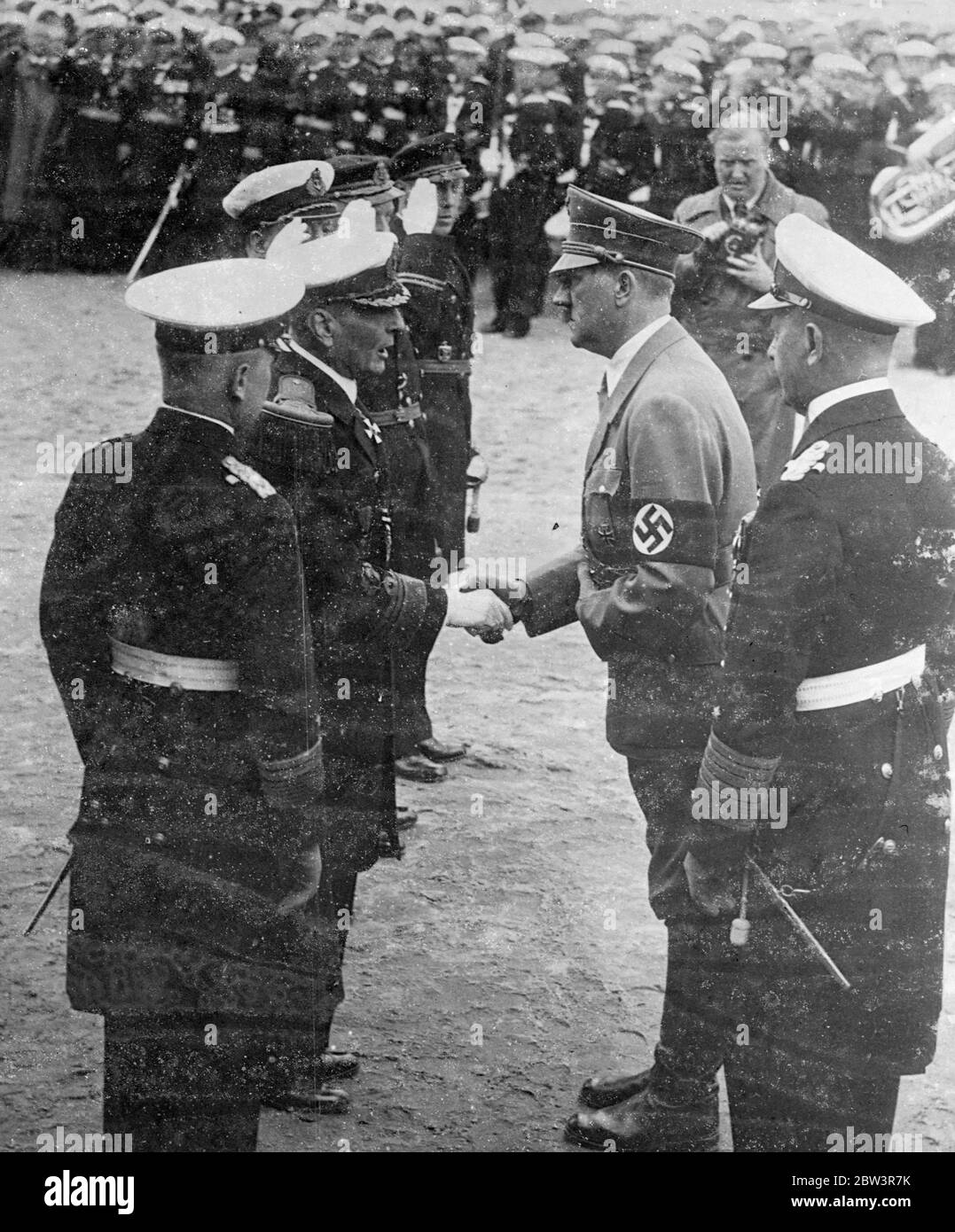 Hitler Talks With Foreign Naval Officers Photo shows : Chancellor Hitler in earnest conversation as he shook hands with foreign naval officers after having inaugurated the new German memorial to sailors at Laboe [ Laboe Naval Memorial aka Laboe Tower ] 1 June 1936 Stock Photo