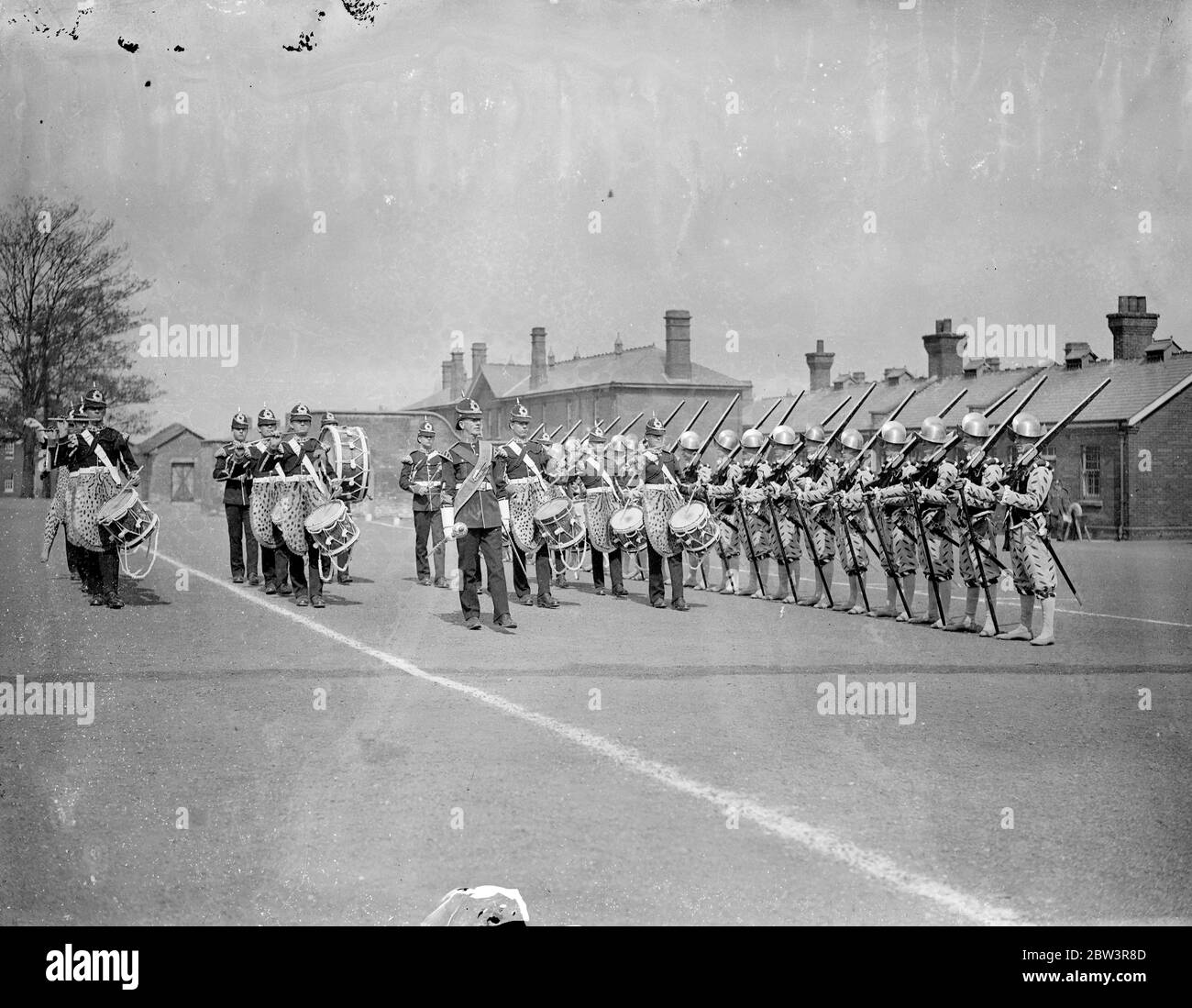 Elizabethan musketeers rehears for Royal Tournament . The 2nd Battalion , the Royal Norfolk Regiment , held a full rehearsal at Aldershot for the pageant which will be a feature of the Royal Tournament at Olympia . Photo shows , ' Musketeers ' of the Elizabethan period led by drummers . 30 April 1936 . Stock Photo