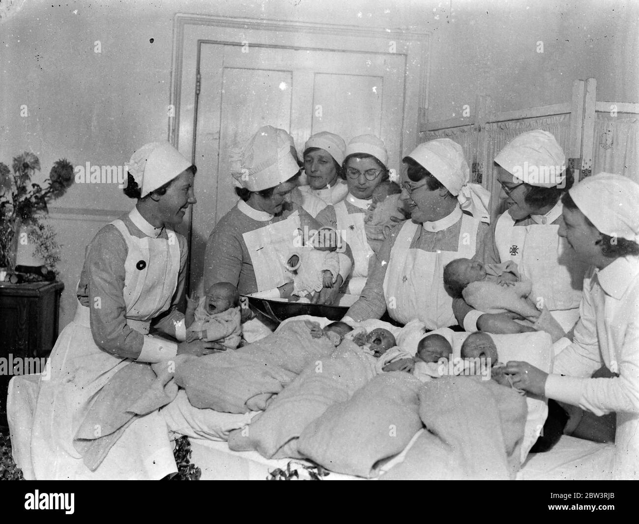 With their mouths wide open . Ten Christmas babies at Queen Charlotte