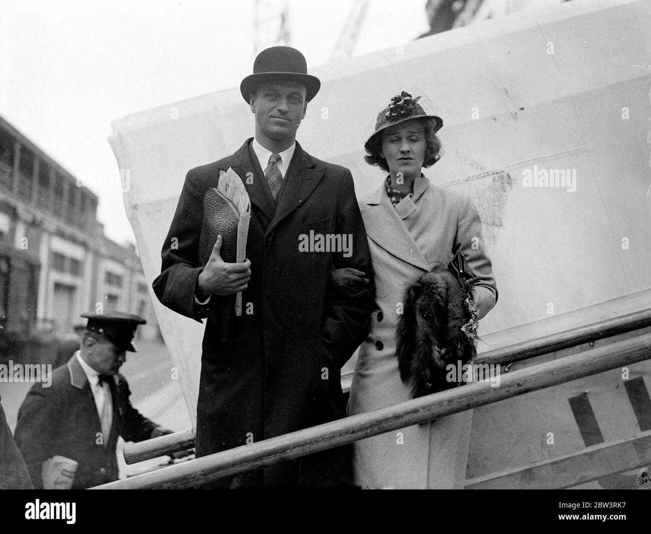 Son of American president sails for home . Mr James Roosevelt , son of President Franklin D Roosevelt of the United States , sailed for home on the liner , SS Manhatten from Southampton accompanied by his wife . Mr Roosevelt has been in England on a buisness trip . Photo shows , Mr and Mrs James Roosevelt at Southampton on departure . 8 May 1936 Stock Photo