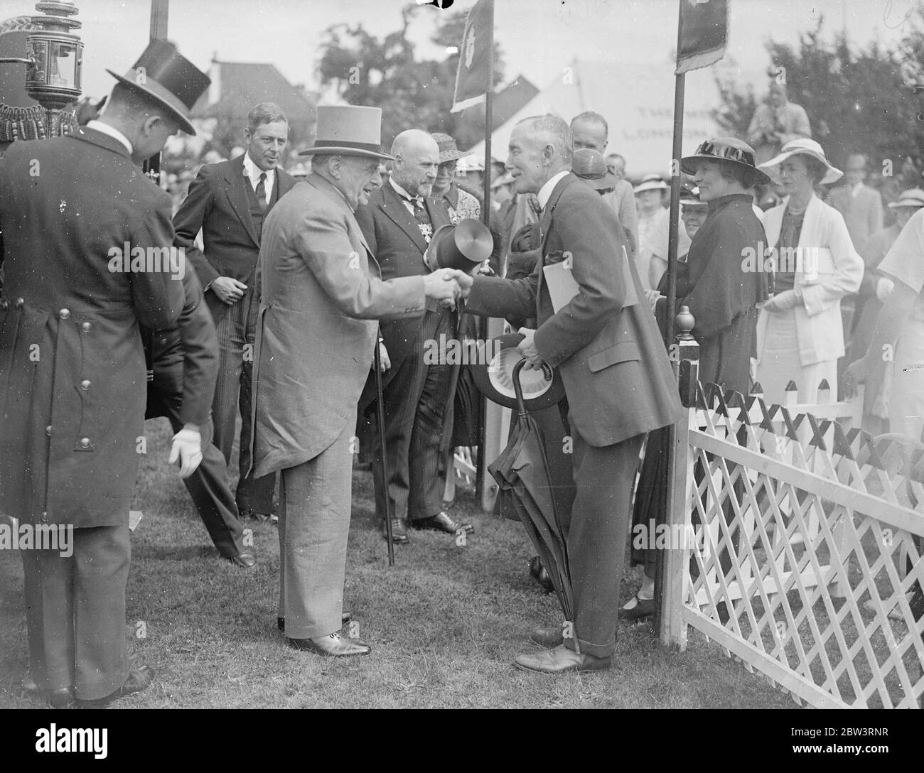 Sir Percy Vincent , ( right ) the Police Commisioner receiving the Lord Mayor on his arrival . 8 July 1936 Stock Photo