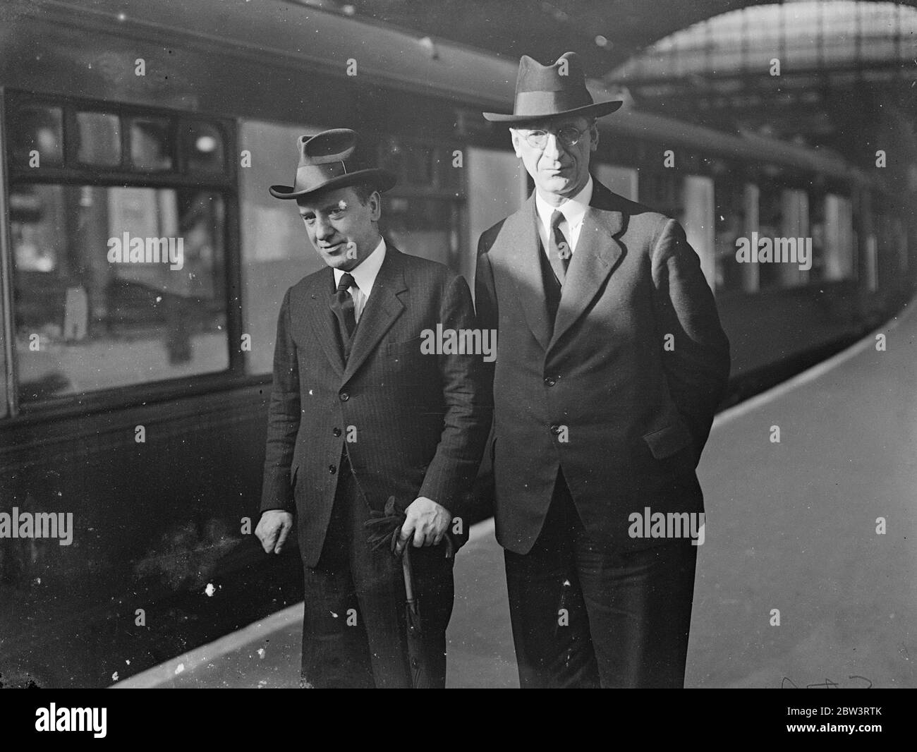 Mr . De Valere , Threatened With Blindness , Leaves London To Receive Treatment In Zurich Mr . Eamon de Valera , President of the Irish Free State Executive Council , left Victoria Station , London , for Zurich , where he is to consult an eye specialist . Mr . de Valera , who is suffering from a dangerous form of eyestrain similar to that which troubled Mr . Ramsey Macdonald , has been warned that unless he submits to immediate treatment he may go blind . Photo shows : Mr Eamon de Valera with Mr . Dulanty , High Comissioner for the Irish Free State before leaving Victoria . 24 Mar 1936 Stock Photo