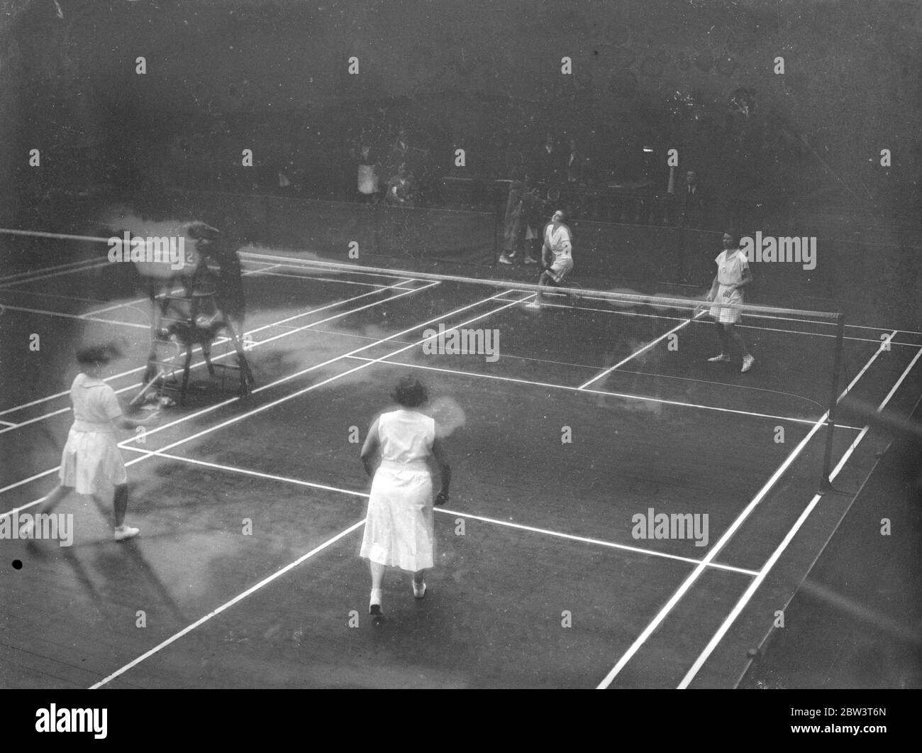 All England badminton championship at Horticural Hall . All England Badminton championships are opened at the Royal Horticultural Hall , Westminster. Photo shows a general view of play . 2 March 1936 Stock Photo
