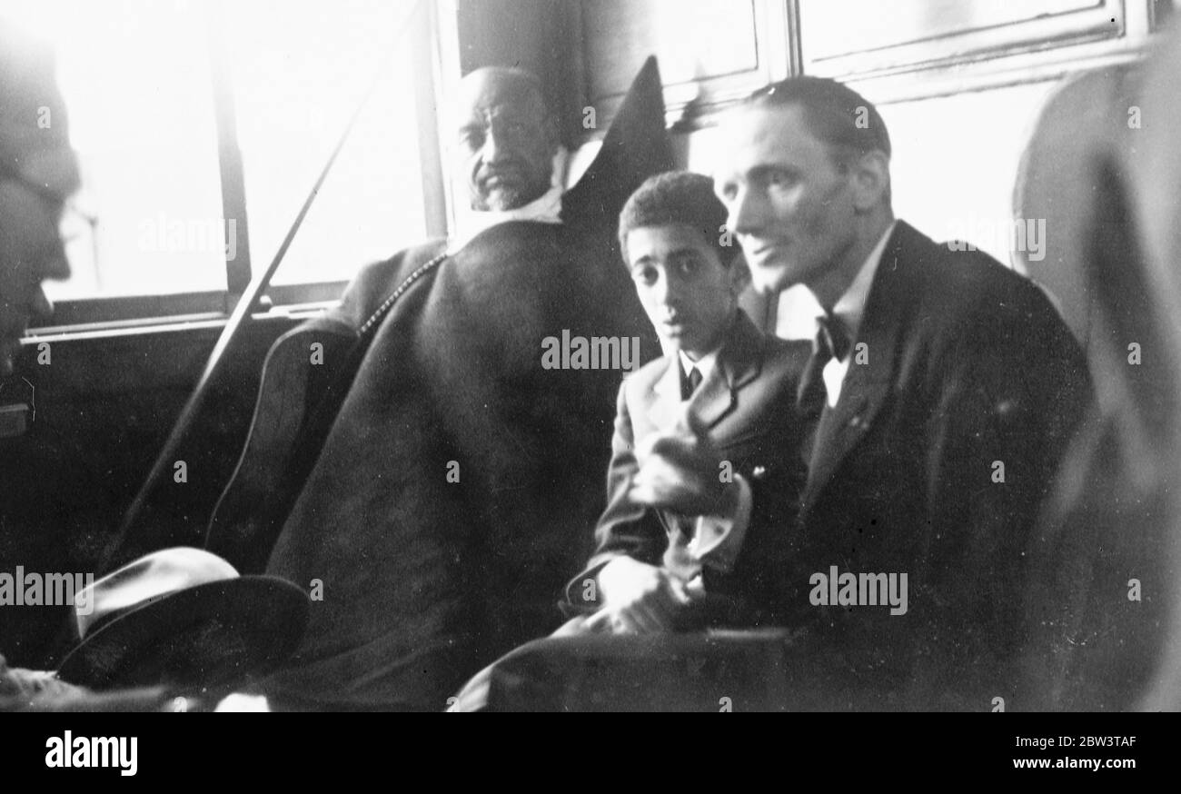 Young Duke of Harar in tears as French tutor leaves capital . The young Duke of Harar in tears as he said goodbye to his French tutor , Commandant Cigli ( right ) . 18 October 1935 Stock Photo
