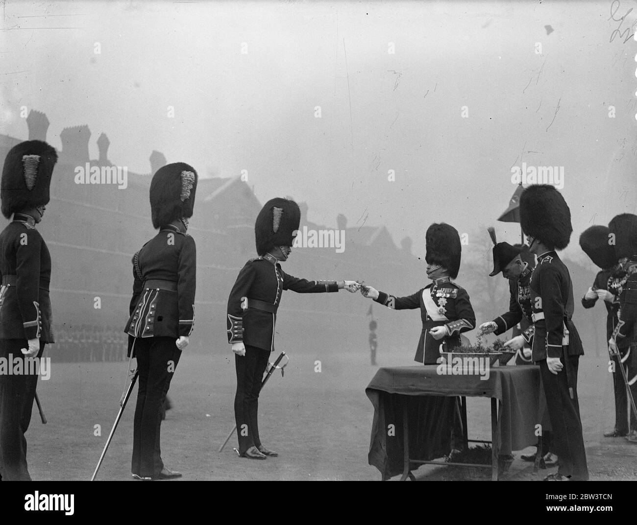 The Earl of Cavan , as Colonel in Chief . The Earl of Cavan presenting shamrock to officers of the Irish Guards at Chelsea Barracks , London . 17 March 1935 Stock Photo