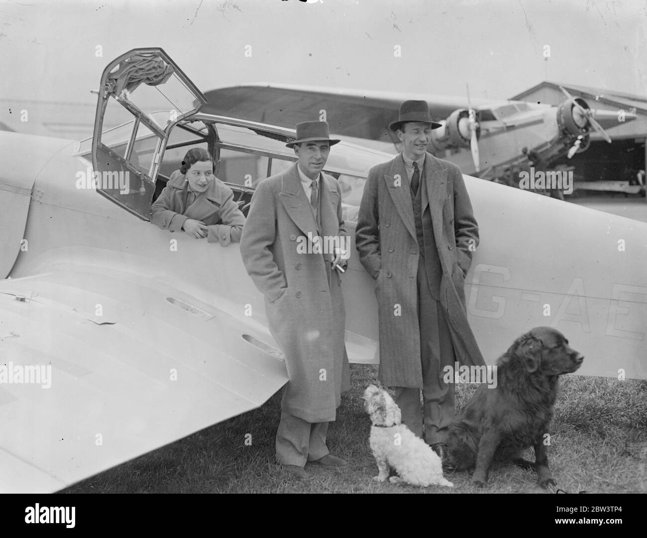 Peer ' s daughter leaves Heston on 30 , 000 mile flight as ' commercial traveller . The Hon Frances Patricia Tollemacho , 27 year old daughter of Lord Tollemacho , who obtained her ' A ' pilot ' s licence after three weeks instruction , left Heston Aerodrome on a 30 , 000 mile trip by aeroplane as a commercial traveller . She is co - piloting a new 160 miles an hour Vega Cull monoplane with Mr Vernon Motion . The object of the trip is to sell British machinery , pumps and instruments abroad . the tour includes Egypt , Palestine , Uganda , Rhodesia , Nairobi and South Africa . Photo shows the H Stock Photo