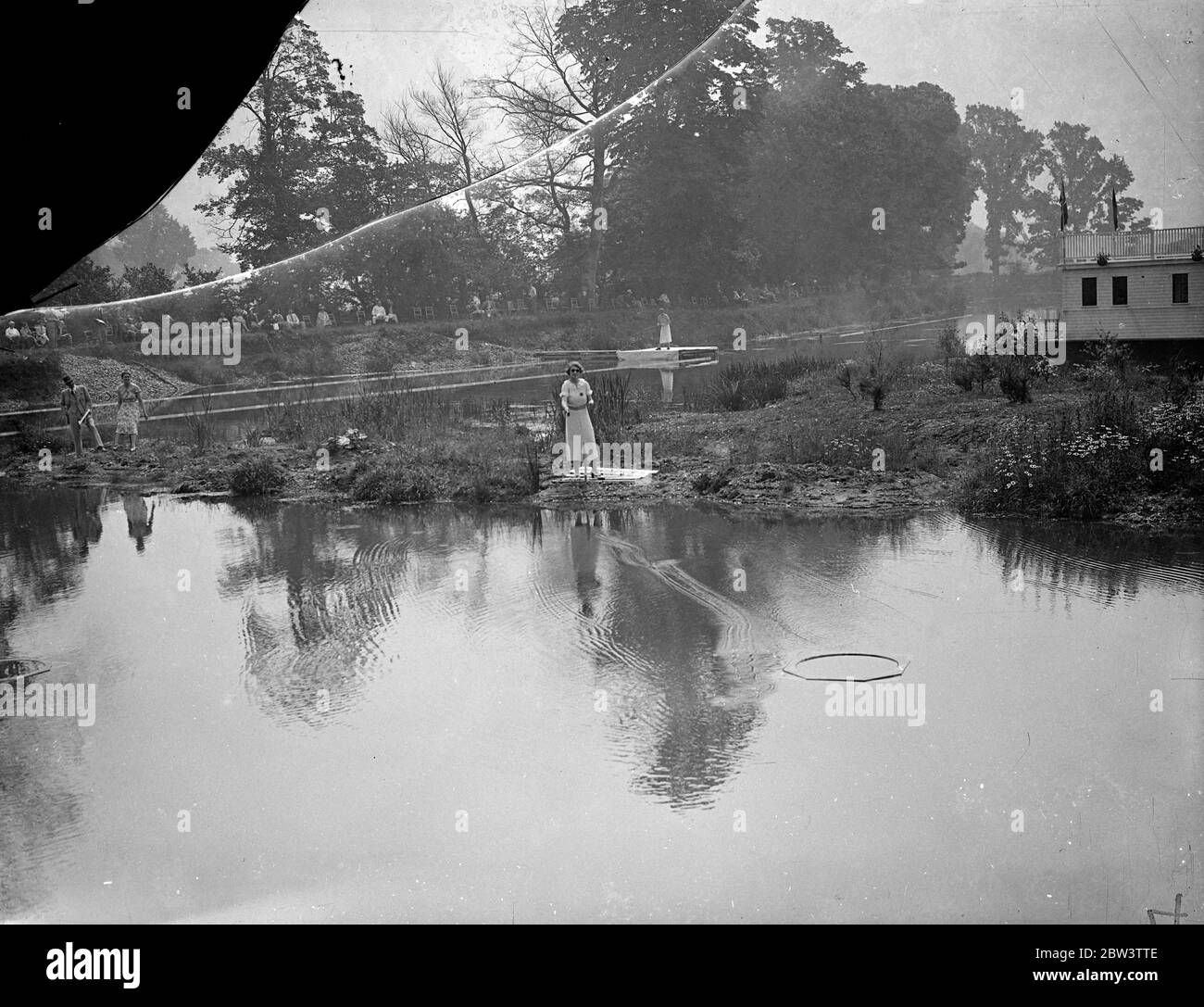 Woman competitor in fly casting tournament at Iver . Miss P Shoubridge casting into a ring in the trout fly accuracy event . 20 June 1936 Stock Photo