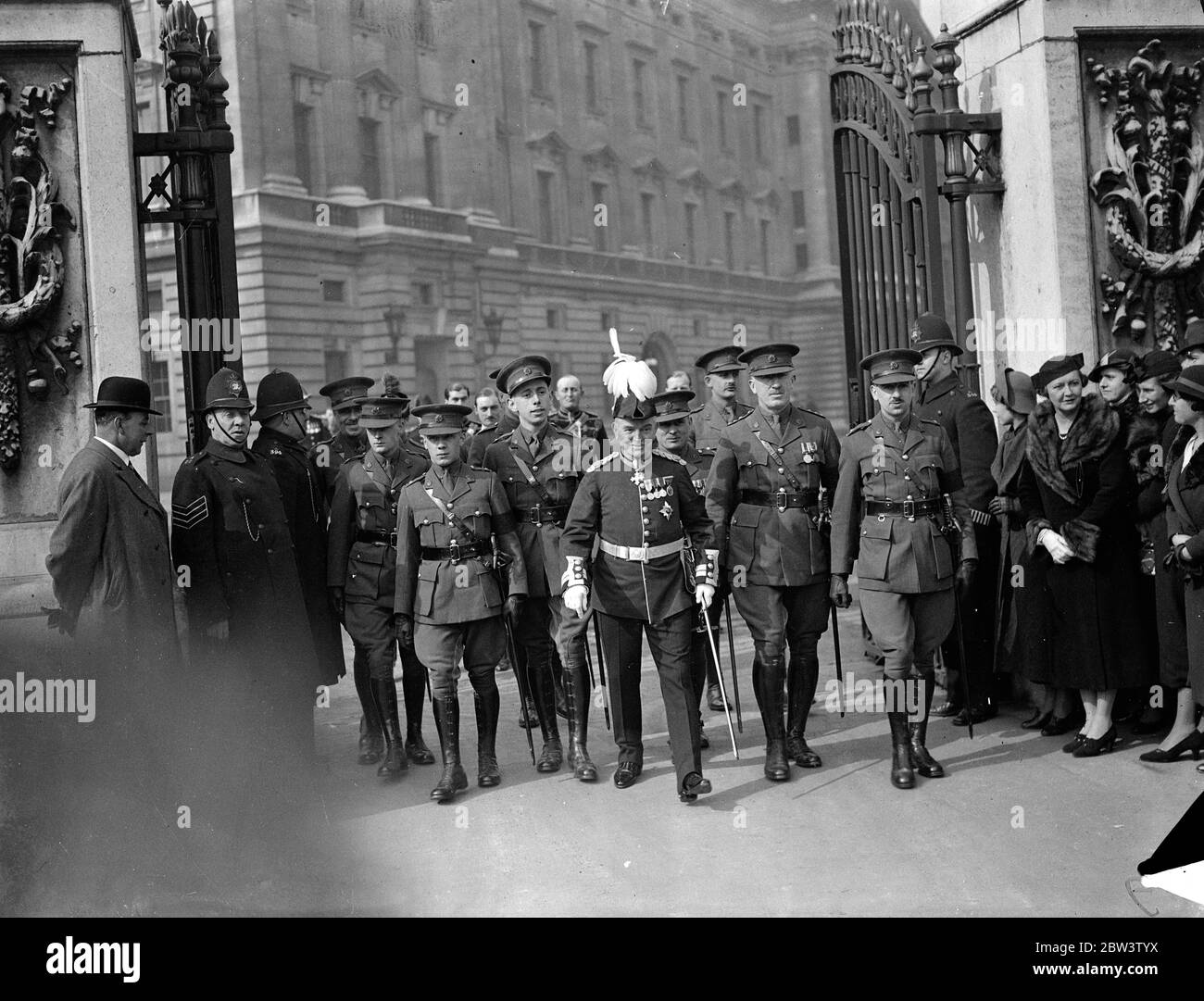 For only the third time in 50 years a Levee was held at Buckingham Palace . The levee council is meeting at St James Palace , the King decided to hold the Levee at Buckingham Palace instead . Photo shows , Col Sir A Holbrook and officers of 44 DIV R A S C . 18 March 1936 Stock Photo