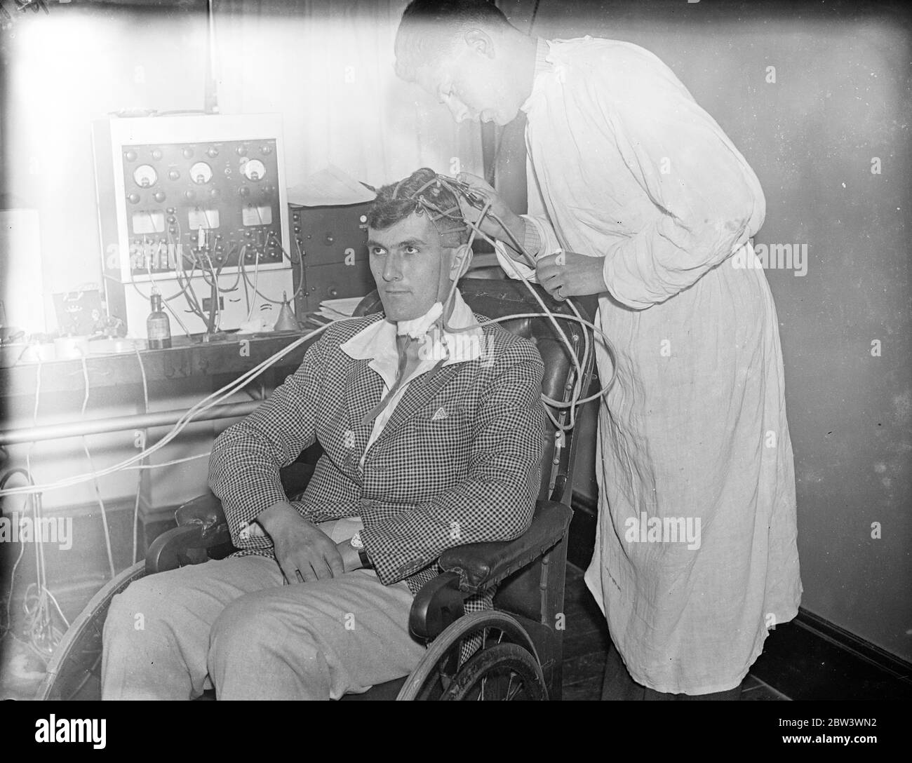 London Scientist Measures Brain Waves . Mr . William Grey Walter , a young Cambridge scientist at the Maida Vale Hospital , London , has devised an apparatus for measuring brain waves . He uses an ordinary radio set as an amplifier and records on an electrical amplifier and records on an electrical measuring apparatus the intensity of the brain waves . Metal plates are placed at chosen spots on the subject ' s skull and connected with the instrument . The experiment prooves that the thought process in human brain produces electrical emanations powerful enough to be visibly recorded . Normal th Stock Photo