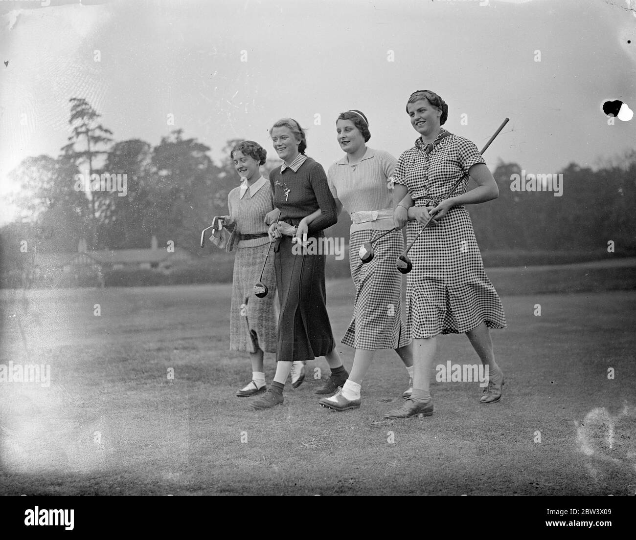 The open golf championship at Stoke Poges . The opening matches in the Girls Open Golf Championship were played at Stoke Poges . Britian ' s leading girl players are being challenged by two French competitors , Lally and Sonia Vagliano , and one South African , Miss Daphne Martyn from Port Elizabeth . Photo shows , left to right , Miss Peggy Edwards , Miss Angela Noble , Miss Pam Shand and Miss Joan Hives . 9 September 1936 Original caption from negative Stock Photo