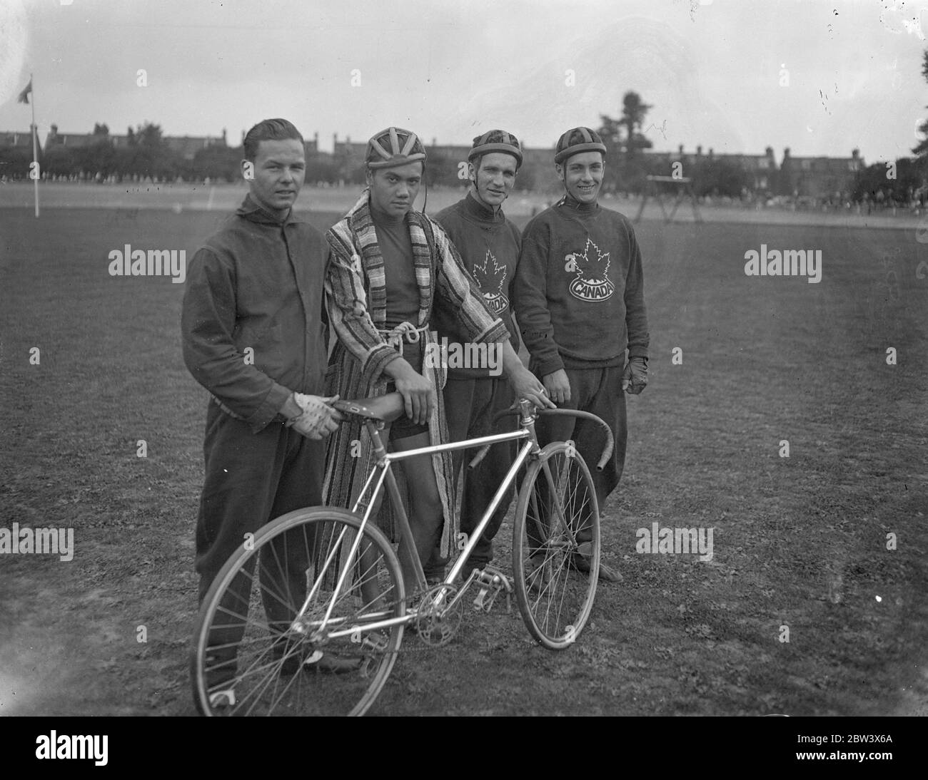 Chinese cyclist competes at Herne Hill for first time . For the first time a Chinese cyclist competed n the Herne Hill track , London , when Howard Wing took part in the international 1 , 000 meters time trial at the Southern Counties Cycling Union ' s international meeting . Photo shows , the Canadian team with the Chinese rider , Lionel Coleman ( Canada ) , Howard Wing ( Chinese ) , George Crompton ( Canada ) and D Peace of Canada . 22 August 1936 Original caption from negative Stock Photo