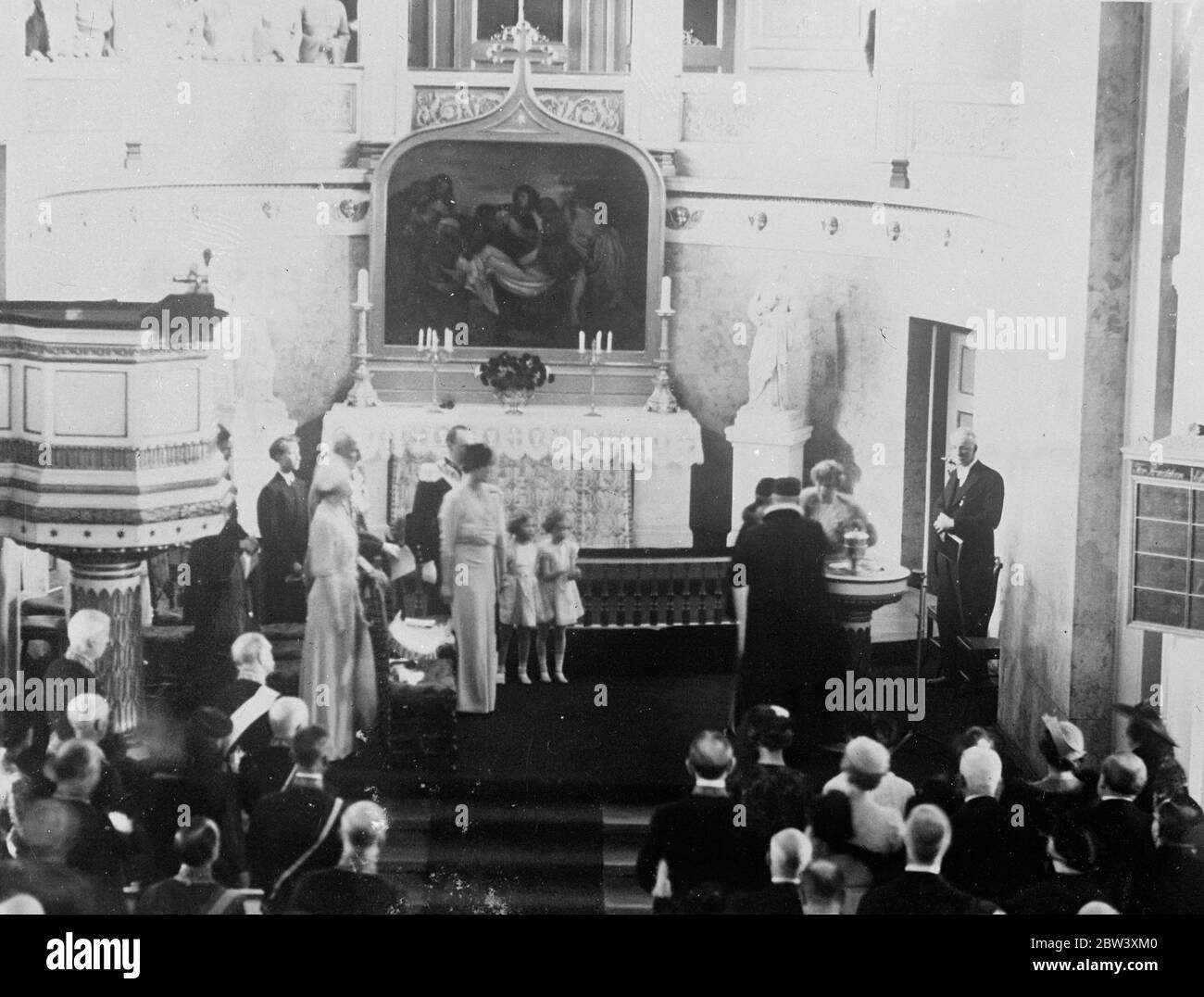 The baby Prince Harald, first prince born in Norway for 600 years, was christened in the royal chapel in Oslo. King Hakkon of Norway and members of the Norwegian and Swedish royal families attended the ceremony. Son of the Crown Prince Olav and Crown Princess Martha, the baby Prince is a second cousin to the British Royal Princess, Elizabeth and Margaret Rose. Photo shows: The Christening ceremony in the royal chapel in Oslo. Left to right Princess Margaretha of Denmark; Prince Carl of Sweden; Crown Prince Olaf and Crown Prince Princess Martha; the princesses Ragnhild Autrid (sisters of the ba Stock Photo