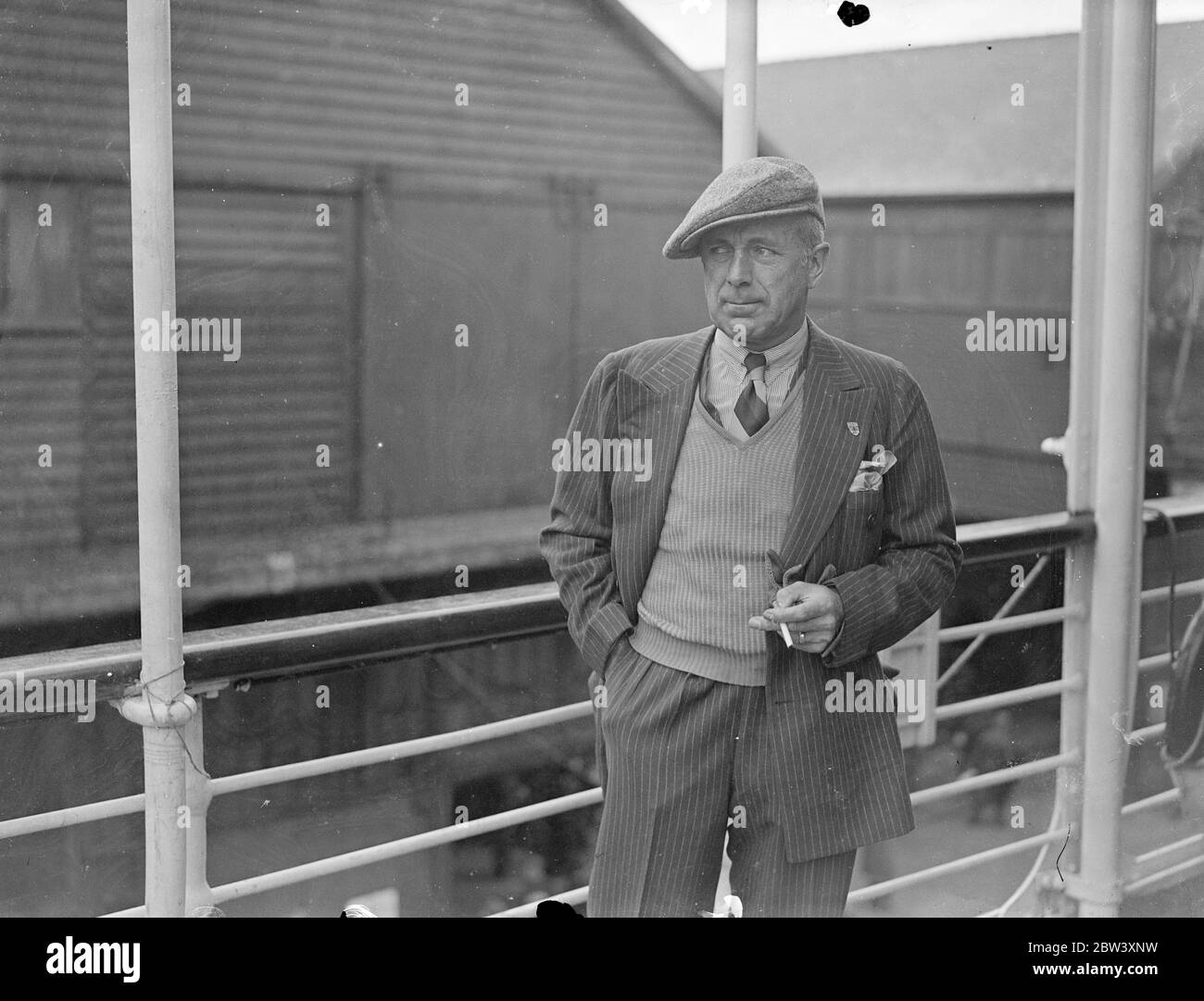 Earl Howe arrives home from South Africa with his wife . Earl Howe , the racing motorist , who was married in South Africa recently arrived at Southampton aboard the liner Athlone Castle with his wife from Cape Town . Earl Howe has been motor racing in South Africa . Photo shows , Earl Howe at Southampton . 19 March 1937 Stock Photo
