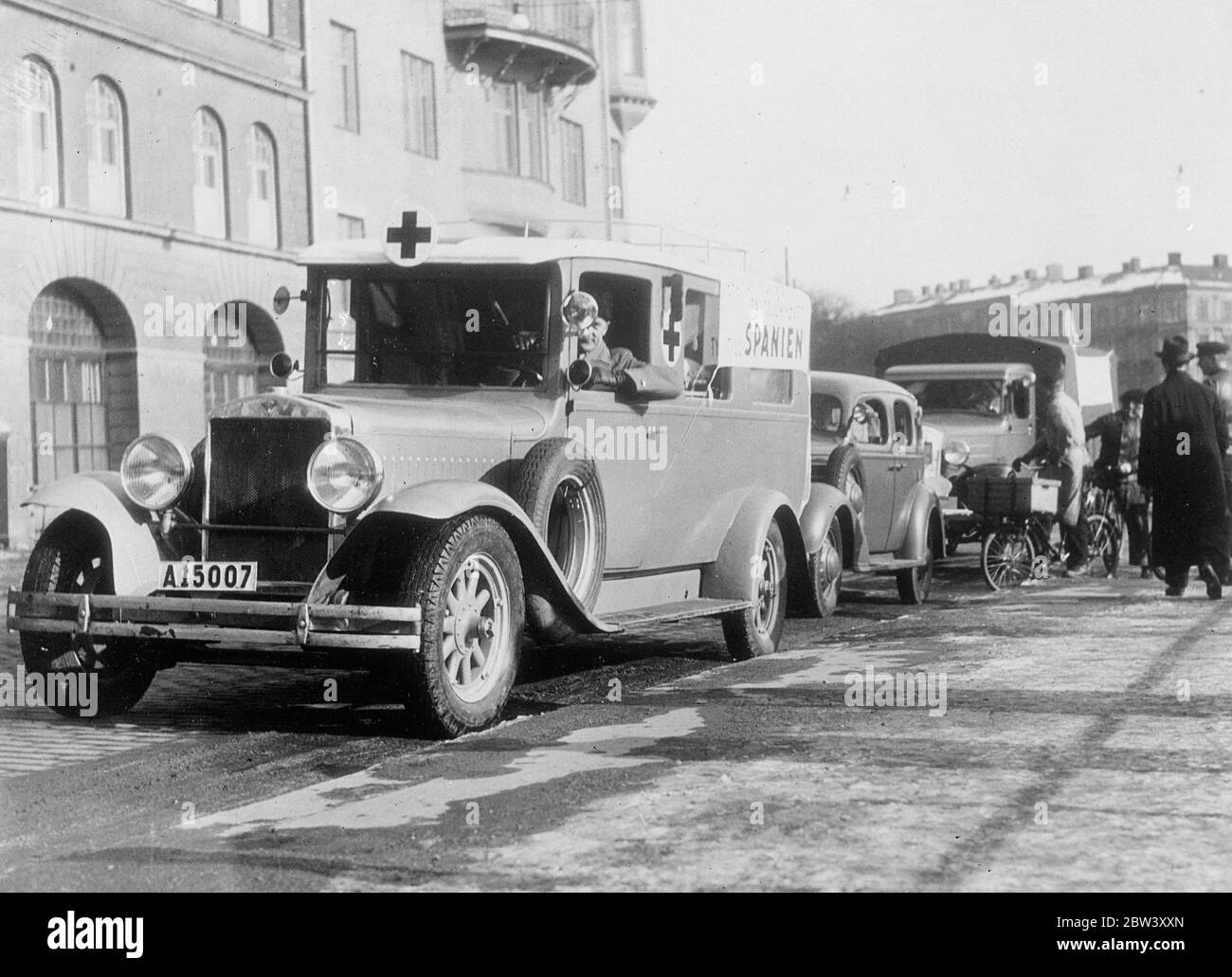 Swedish , Norwegian field hospitals Chiefs leave Stockholm for Spain . Captain B H Natt och Dag , Superintendent of the Swedish - Norwegian Field Hospital for Spain and Dr Nils Silverskiold , the Chief Surgeon , left Stockholm with three vehicles , for the Spanish civil war zone . Photo shows , three of the vehicles belonging to the Swedish section of the hospital leaving Stockholm for Spain . They were shipped from Gothenburg . Stock Photo