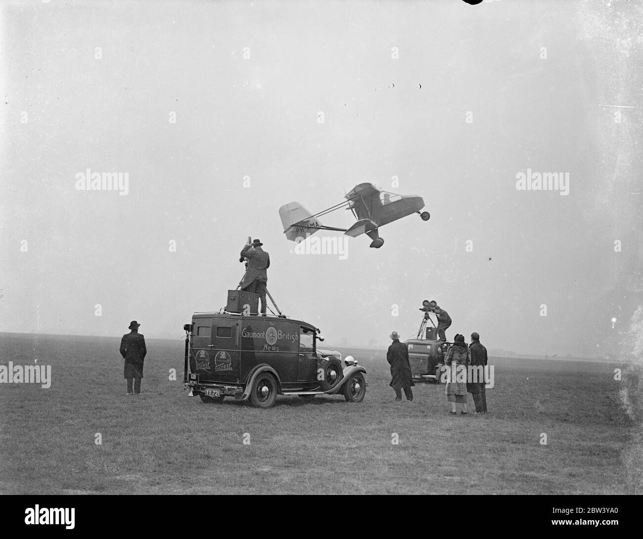 Fool-proof flights plane crashes at Gravesend Demonstration - pilot trapped in wreckage. The first demonstration in England of the Schelemusch, a Dutch light plane said to be full-proof, ended in a crash at Gravesend Aerodrome. The plane was piloted by Mr R. G. Doig who was injured. The machine was flying low and trying to make a sharp turn when it was caught by a gust of wind and completely wrecked. Mr Doig's leg was caught in the wreckage, the pilot having to wait until rescuers could extricate him. The Schelemusch, a singles-seater, is fitted with a 40 horsepower twin cylinder engine of the Stock Photo