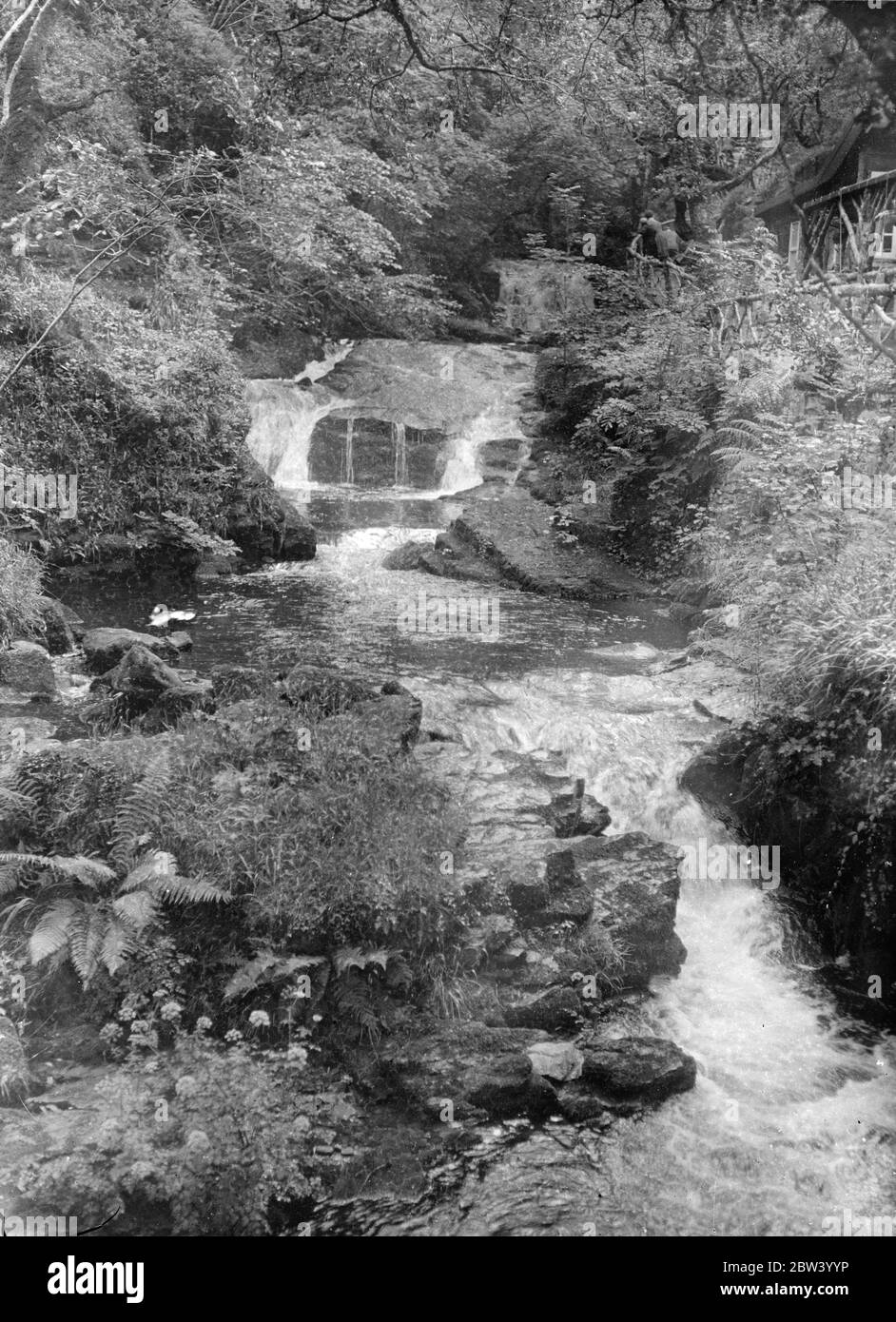 Waters meet in Clovelly in Torridge , Devon, England Stock Photo Alamy