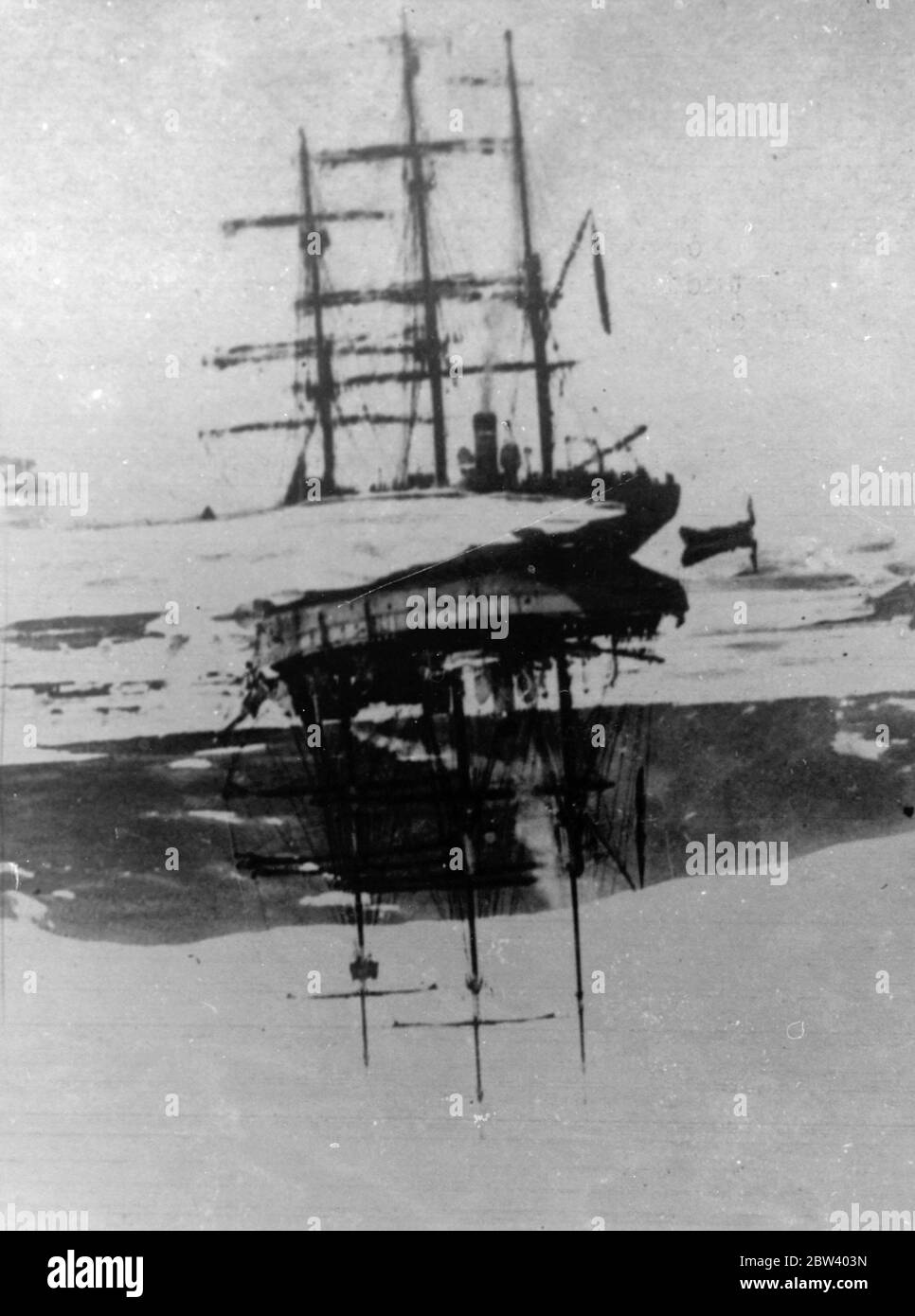 Famous French Polar explorer and crew drowned when ship founders in Iceland storm. Sailing on his last voyage, Dr Jean Baptiste Charcott, Shackleton of France and 29 members of the crew of his famous Polar exploring ship the Pourquoi-Pas (449 tons) were drowned when the vessel sank in a storm in Faxa Bay, Iceland. The ship ran aground, but terrific waves breaking over her prevented the launching of the lifeboats. Every man was washed overboard, and only one survived. Dr Charcot was 69, led two expeditions to the South Polar regions. Photo shows: The Pourquoi Pas in the ice off Greenland. 17 Se Stock Photo