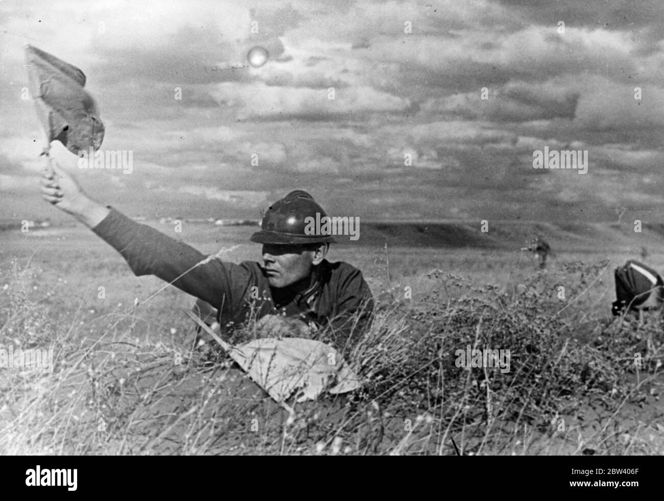 Soviet Army autumn manoeuvres as war chief warns potential enemies. With their leaders thundering counter warnings across the continent of Europe, troops of the Soviet Army are on the march in the Ukraine, where they are carrying out the autumn manoeuvres. Aeroplanes and tanks are cooperating in the exercises. In a speech made at Kiev, Voroshilov, Soviet Commissar for Defence, where has been attending the manoeuvres, issued a warning in which he declared: if anybody attempts to attack our country we will take up arms. We are ready for war, comrades. Photo shows: A signaller of the Blue Army at Stock Photo
