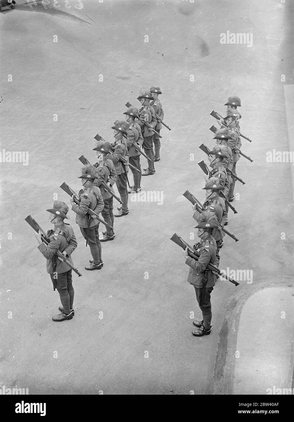 Funeral of Australian VC in London . Full military honours . With full military honours , the body of Gunner A P Sullivan, the Australian VC , was taken from Wellington Barracks to Golden Green for Cremation. Gunner Sullivan a Member of the Australian Coronation Contingent, Was Knocked down and Killed by a Cycle Last Week. Photo Shows, Members of the Australian Coronation Contingent with Arms Reversed as the Cortege Left Wellington Barracks . 13 April 1937 Stock Photo