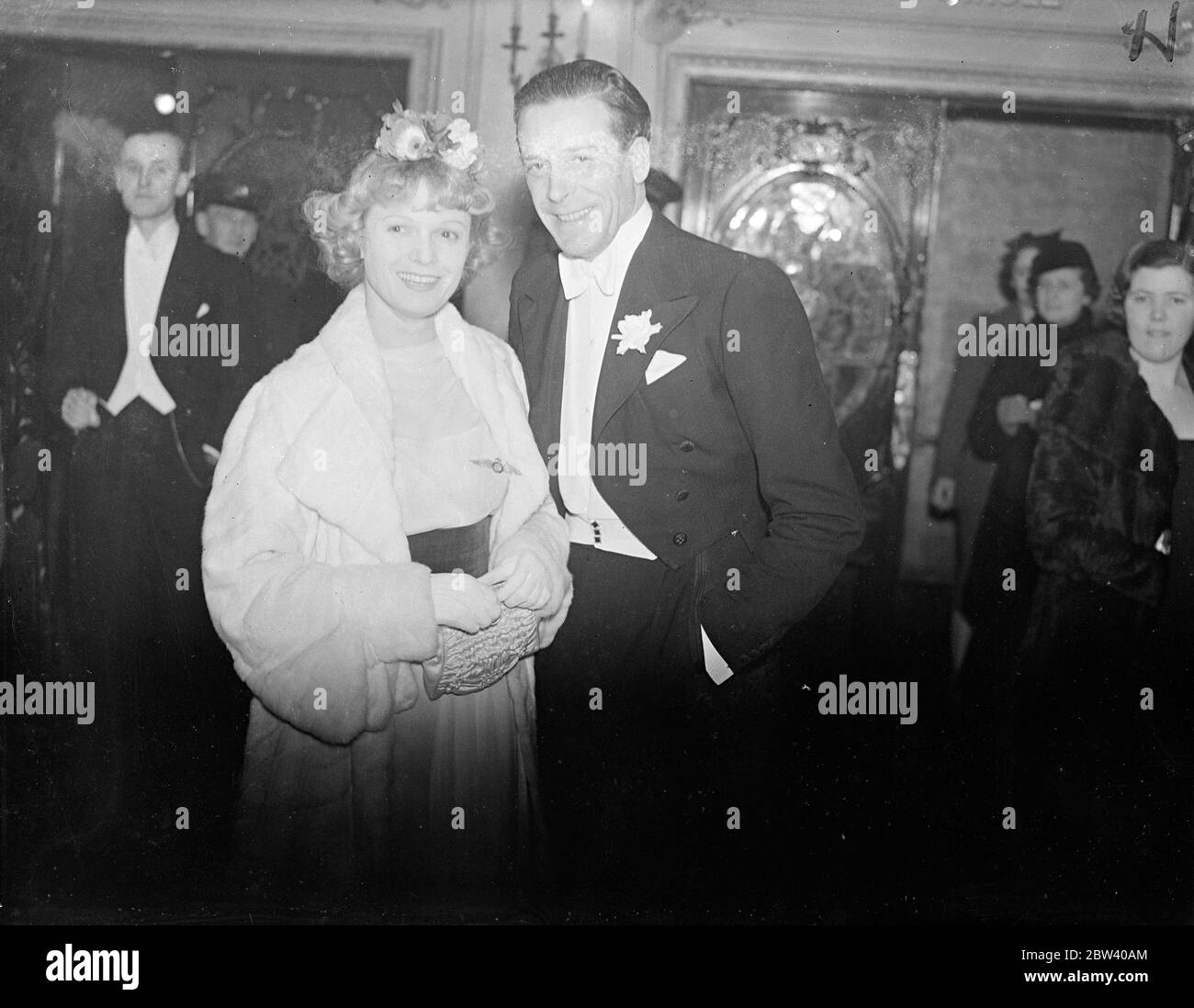 Jack Buchanan and Anna Neagle at Scout film premiere. Attended by the Duke and Duchess of Gloucester the world premiere of the Boy Scouts ' film ' The Gang Show ' which was given at the Lyceum , Strand . Proceeds of the Premier are to be divided equally between the Boy Scouts Association and the National Association of Boys Clubs . Photo shows , Jack Buchanan and Anna Neagle , the film actors , arriving for the Premier . 13 April 1937 Stock Photo