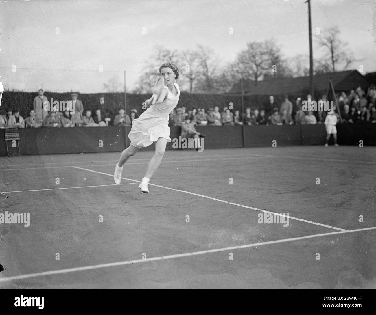 Mary Hardwick wins title in Roehampton tournament. Kay Stammers in car smash before match . Although she had been involved in a car smash on her way to the match , Miss Kay Stammers played Miss Mary Hardwick in the final of the Roehampton Holocaust tennis Championships but was beaten 8 - 6 , 7 - 5 . Photo shows , Mary Hardwick in action . 10 April 1937 Stock Photo