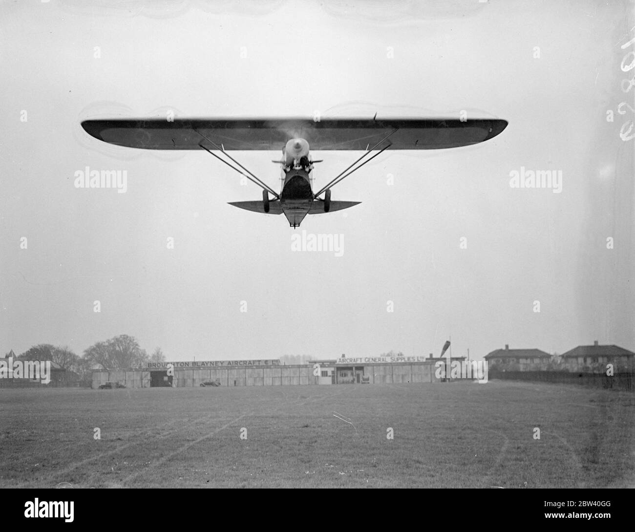 New £180 aeroplane demonstrated At Handsworth Aerodrome. A £180 light aeroplane, the cheapest made, was demonstrated for the first time at Hanworth Aerodrome. The machine was designed and manufactured by Captain C. H. Latimer-Needham of Luton Aircraft. It is equipped with a motor-cycle engine which runs on ordinary commercial spirit that can be drawn from any petrol pump. The machine has a speed of 85 miles an hour with a range of 300 miles. Photo shows: the new aeroplane, piloted by Mr D. Berrington, in the air at Hanworth Aerodrome. 24 April 1937 Stock Photo