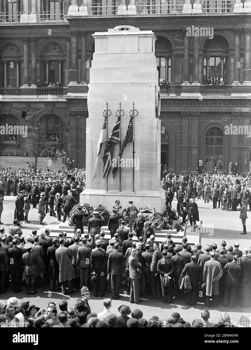 Coronation troops parade for Anzac Day ceremony at Cenotaph. Members of the Coronation contingent, who are in London for the Coronation, paraded at at Cenotaph after attending the Anzac Day at Saint Pauls Cathedral. [Australian and New Zealand Army Corps] Photo shows: the scene at the Cenotaph during the Anzac Day parade. 25 April 1937 Stock Photo