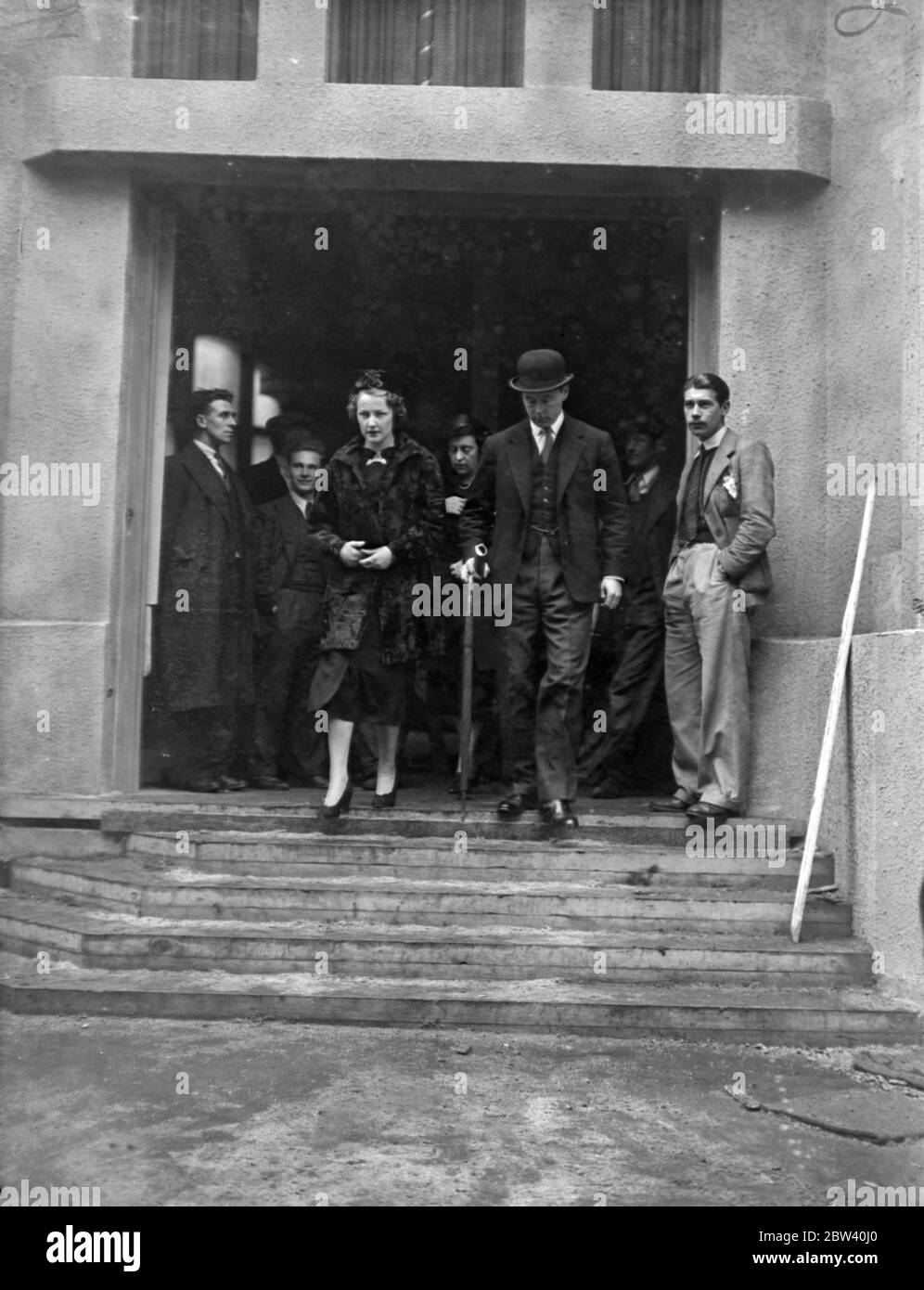 Duke and Duchess of Norfolk at Coronation rehearsal. The Duke of Norfolk, the Earl Marshall, and the Duchess were present at the Coronation rehearsal in Westminster Abbey. Photo shows: the Duke and Duchess of Norfolk leaving after rehearsal. 20 April 1937 Stock Photo