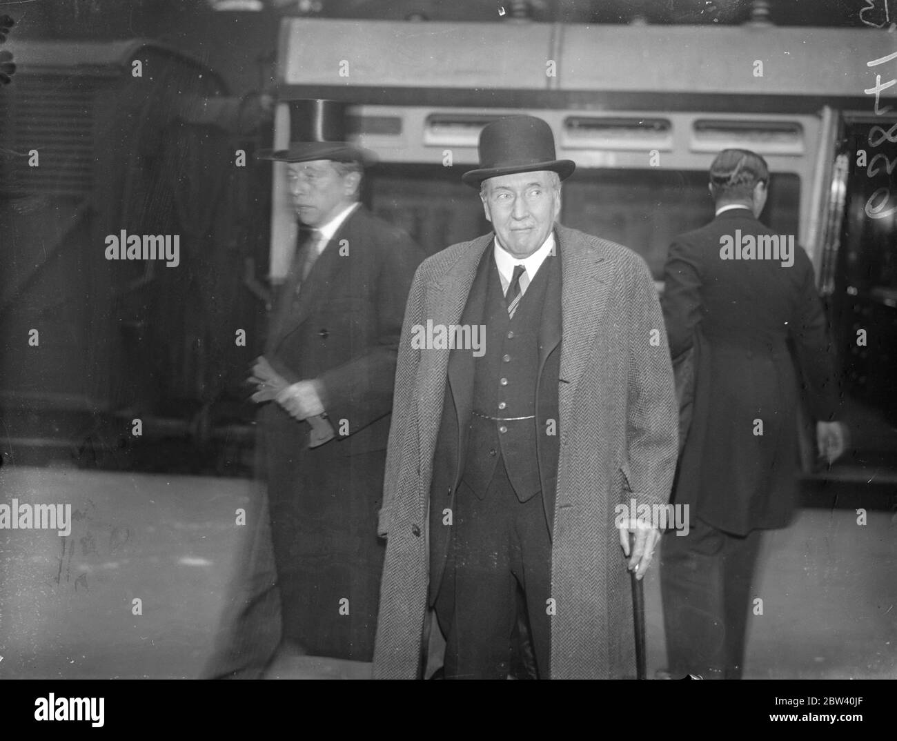 America's Coronation envoy arrives in London. Mr James W. Gerard, president Roosevelt's special envoy to Great Britain for the Coronation, arrived at Paddington Station, London with Mrs Gerard after landing from the Queen Mary at Plymouth. Mr Gerard was Ambassador in Berlin until the United States declared war. Photo shows: Mr James W Gerard on arrival at Paddington. 26 April 1937 Stock Photo