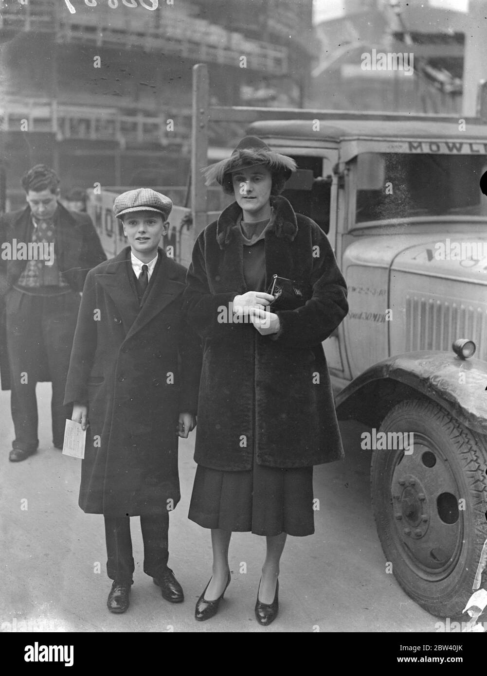 Duchess of Norfolk's stepmother at Abbey rehearsal. Peers and peeresses attend a rehearsal of the Coronation ceremony at Westminster Abbey. Photo shows: Lady Belper with her son, Hon. Peter Strutt, at the Abbey stop lady Belper is stepmother of the Duchess of Norfolk 26 April 1937 Stock Photo